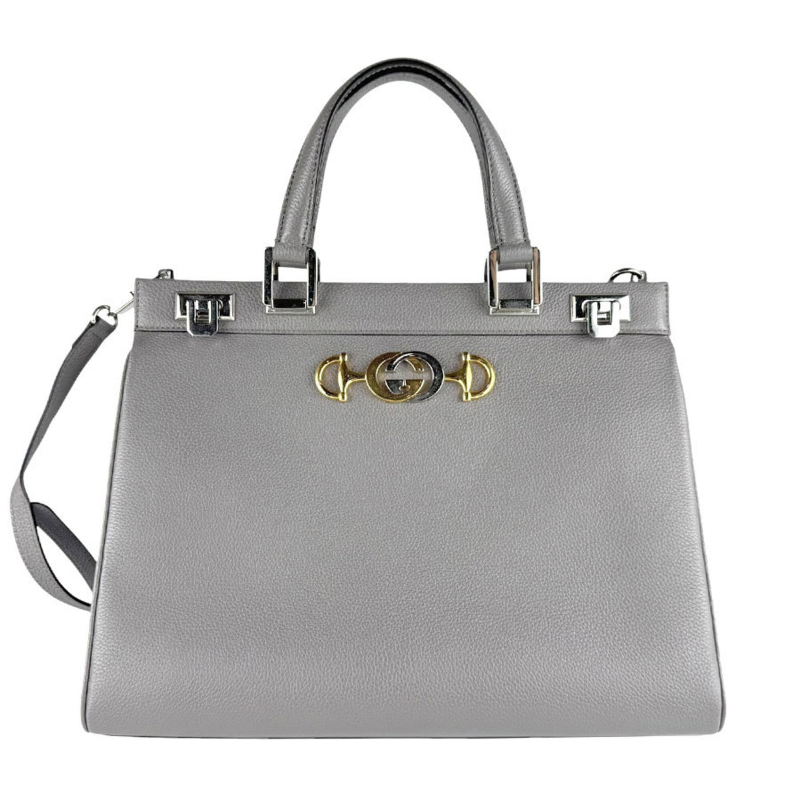 Gucci Handbag Shoulder Bag Leather: Gucci Handbag Shoulder Bag Leather The Gucci Handbag Shoulder Bag Leather features a sleek gray leather design with a classic shoulder bag style. Made from high-quality leather, its dimensions are