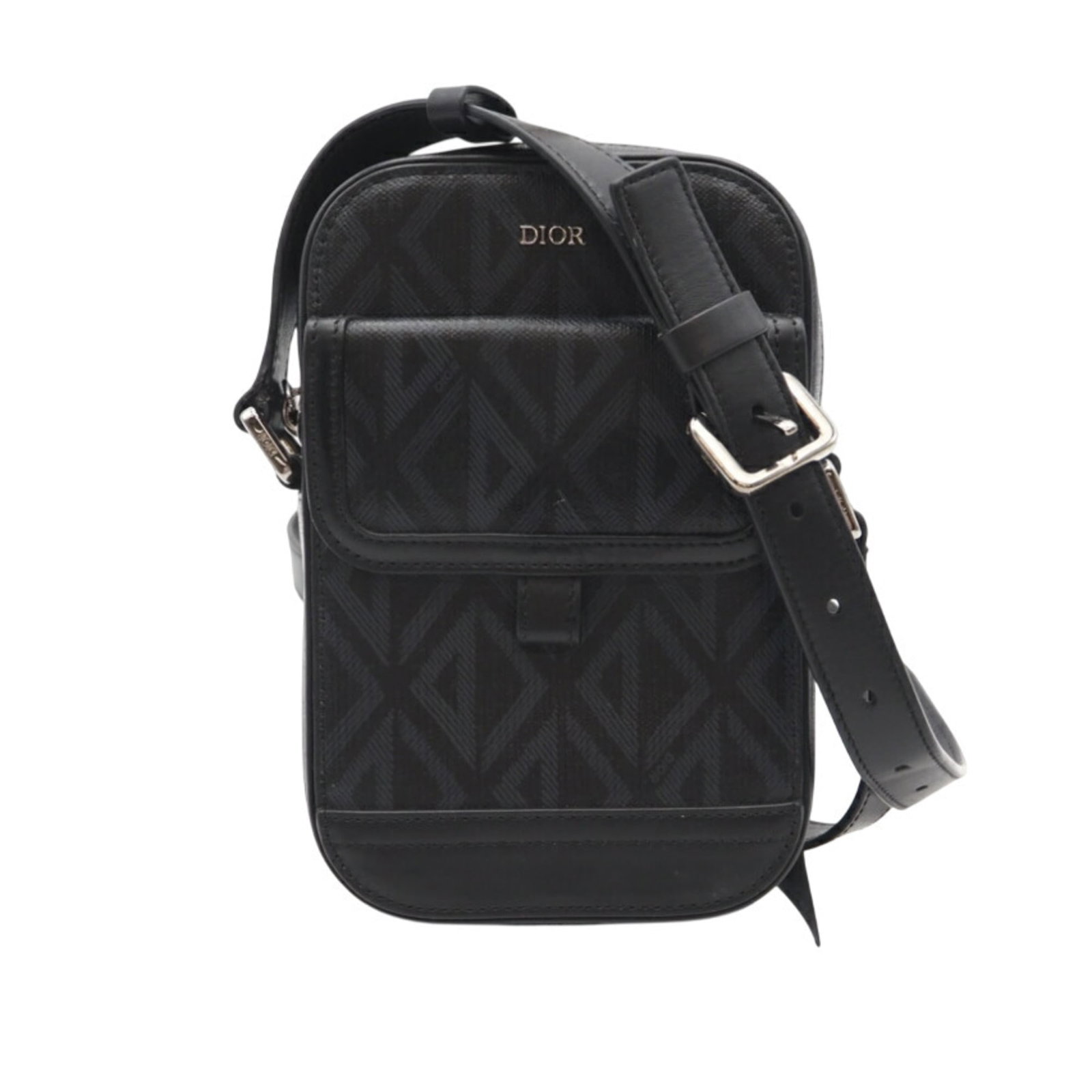 Shoulder Bag Canvas Coated by Christian Dior: Shoulder Bag Canvas Coated by Christian Dior Christian Dior's shoulder bag boasts a sleek, coated canvas design in black and gray hues. Measuring 19cm x 12.5cm x 4.5cm, the bag features a compact size