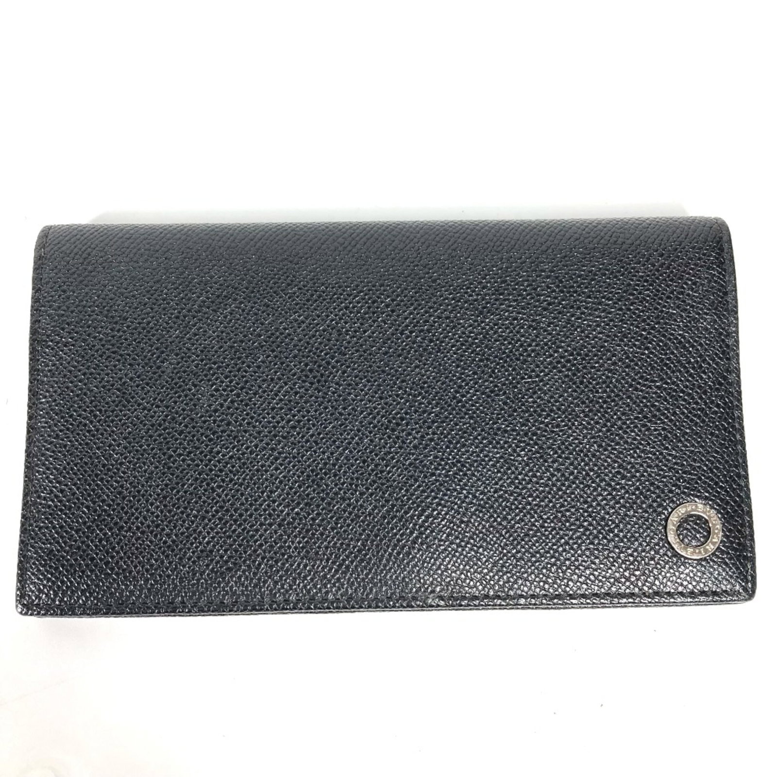 Long Bi fold Wallet Leather: Long Bi fold Wallet Leather Black leather long bi-fold wallet with clean lines and classic design. Measuring 10cm x 17.5cm, it offers a spacious interior for organization and storage. Made from