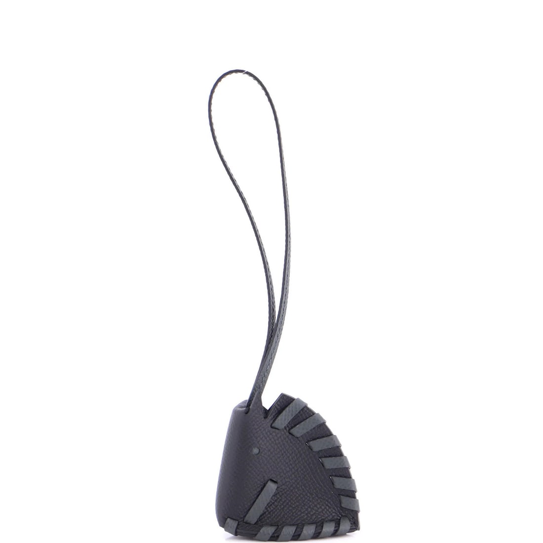 Hermes Cheval Tresse Bag Charm Leather: Hermes Cheval Tresse Bag Charm Leather The Hermes Cheval Tresse Bag Charm Leather is a sleek and sophisticated accessory, measuring 2.5" in height, 2.5" in width, and 1" in depth. Made from