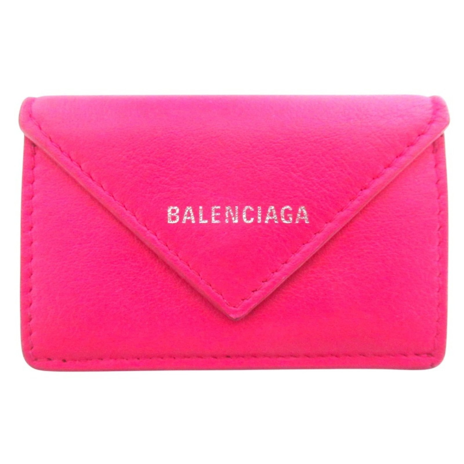 Balenciaga Wallet (Tri-Fold) Leather: Balenciaga Wallet (Tri-Fold) Leather The Balenciaga tri-fold leather wallet boasts a striking pink hue, adding a pop of color to any outfit. Measuring 6.5cm x 9.5cm x 2.5cm, it offers a sleek and