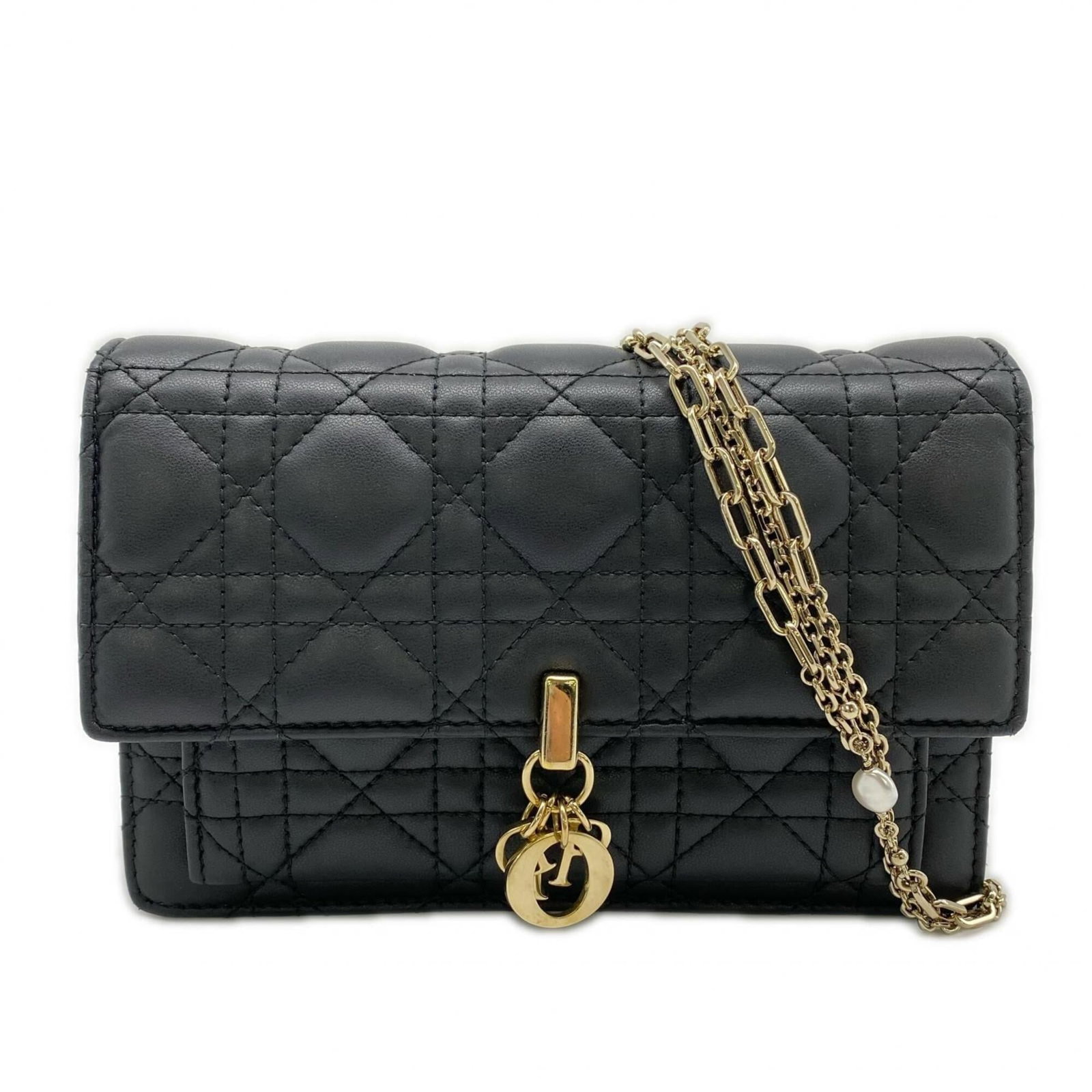 Shoulder bag leather by Christian Dior: Shoulder bag leather by Christian Dior The Christian Dior shoulder bag is crafted from high-quality leather, featuring a classic design with a black calfskin finish. Measuring 12.5cm x 19cm x 4cm, it 
