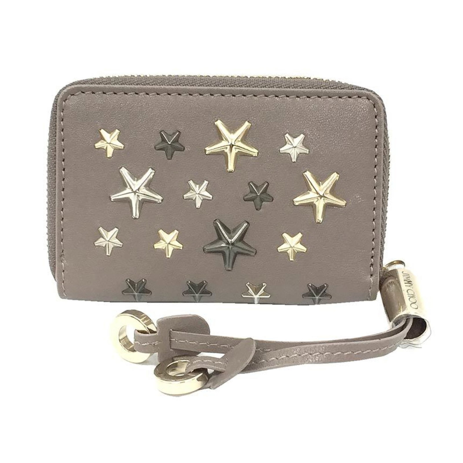 Jimmy Choo case leather purse coin: Jimmy Choo case leather purse coin Grayish, metallic leather coin purse from Jimmy Choo, measuring 7cm x 10cm x 2cm. This compact case features a sleek design and durable construction. The signature b