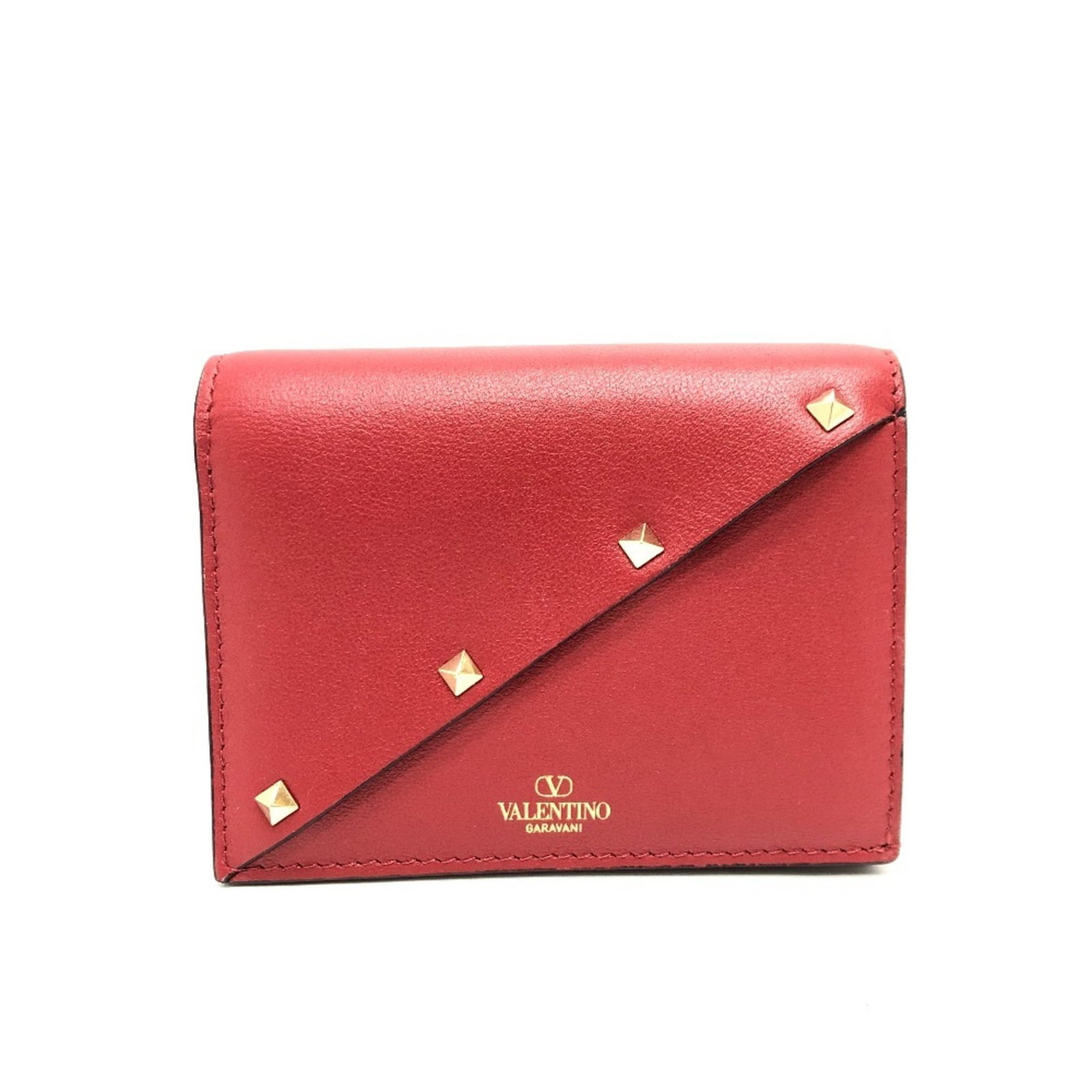 Coin purse leather case Valentino: Coin purse leather case Valentino Valentino's iconic red leather coin purse case boasts sleek dimensions and premium materials, making it a stylish accessory for everyday use. The compact size and ele