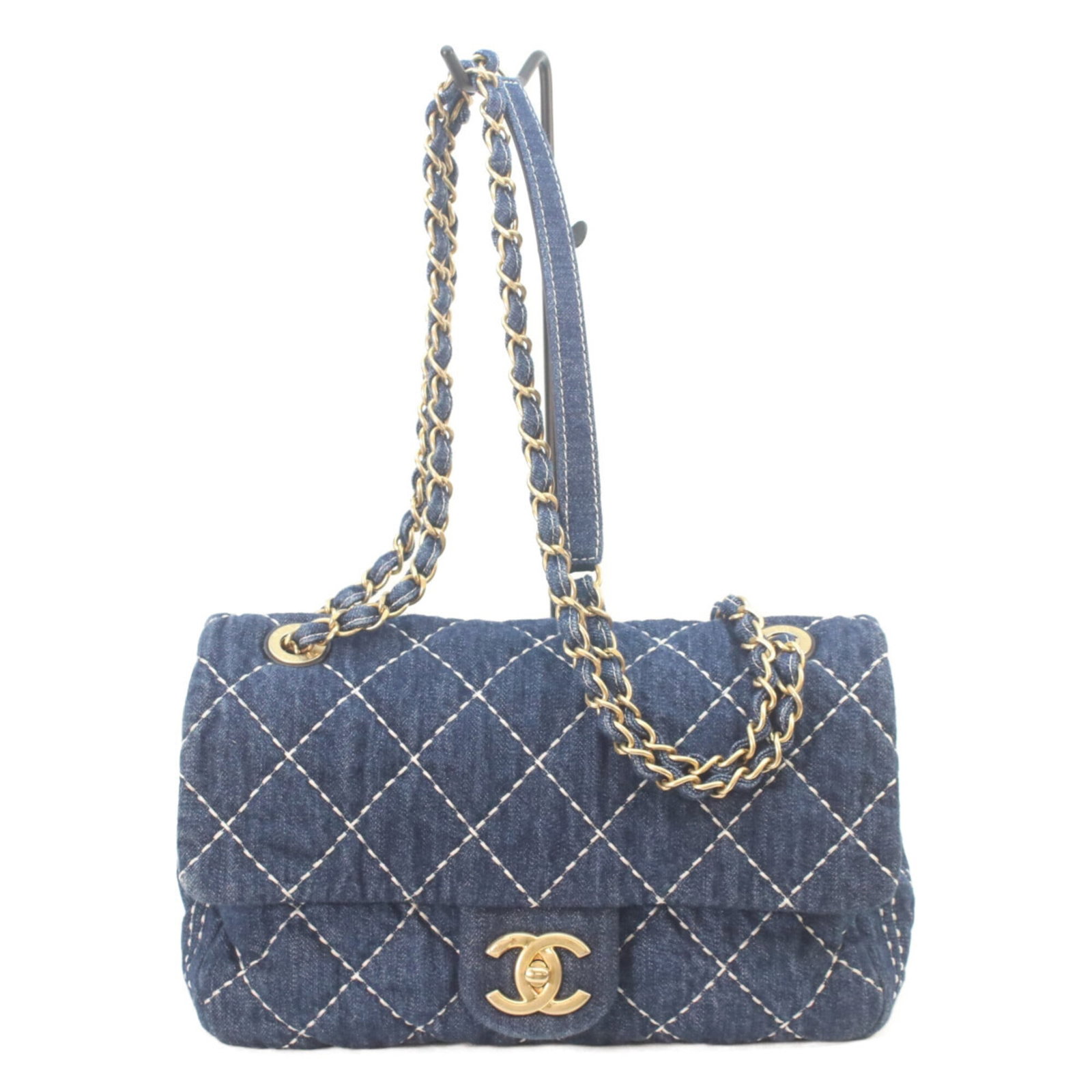 Denim Chanel Shoulder Bag: Denim Chanel Shoulder Bag Denim Chanel Shoulder Bag features a unique denim material and gold hardware, standing out from traditional Chanel designs. Measuring 16.5cm x 26cm x 8cm, this shoulder bag