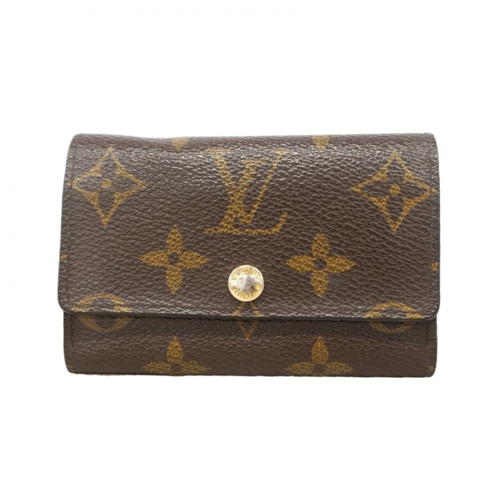 Keycase by Louis Vuitton: Keycase by Louis Vuitton Brown Louis Vuitton Keycase with sleek dimensions, measuring 7.5cm x 10.5cm x 1.5cm, making it a compact and stylish accessory for daily use. The classic design of the keychai