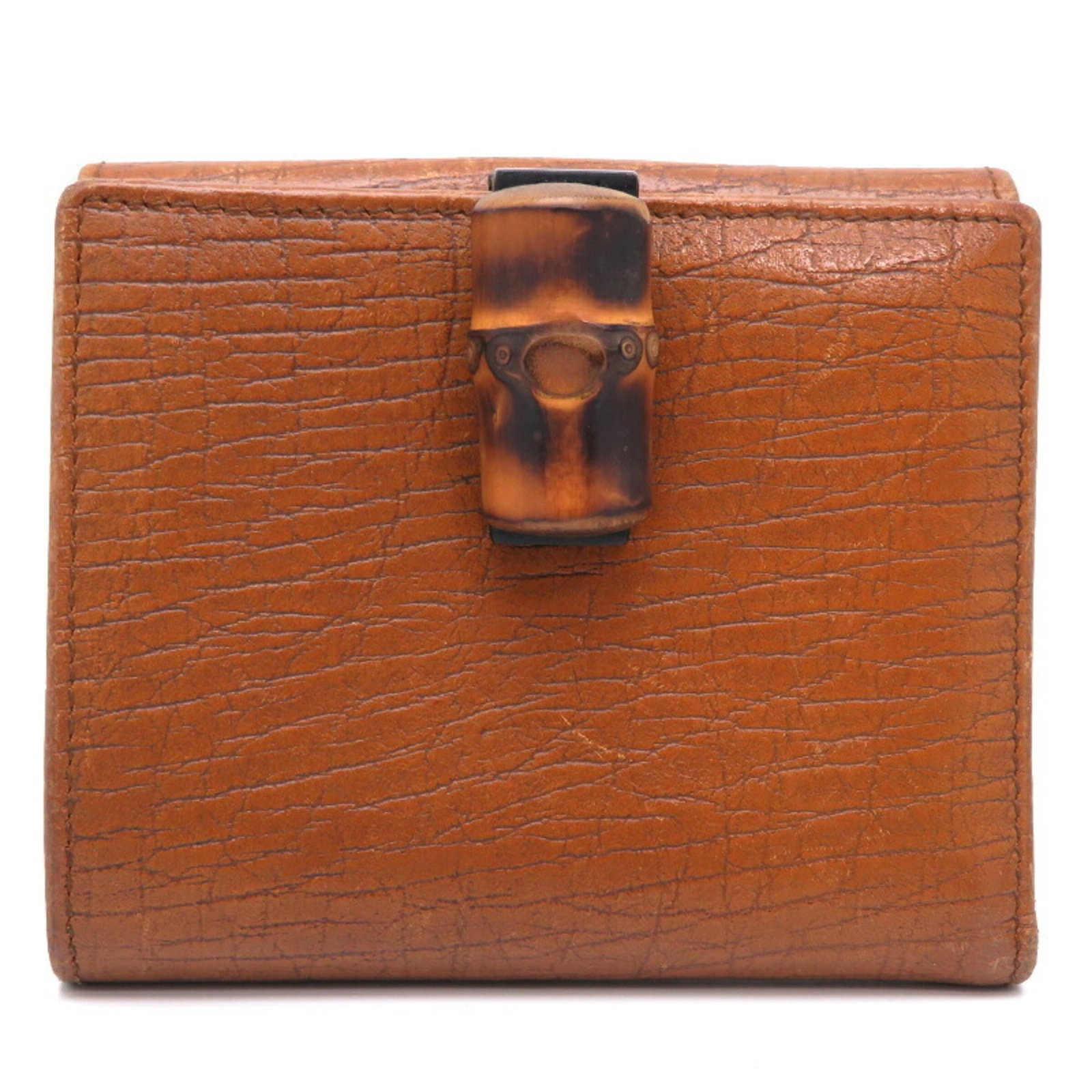 Bamboo Leather Bi Fold Gucci Wallet: Bamboo Leather Bi Fold Gucci Wallet Bamboo Leather Gucci Wallet. Made from bamboo and leather, this bi-fold wallet features a camel color with a flap closure and six card slots. The snap pocket on