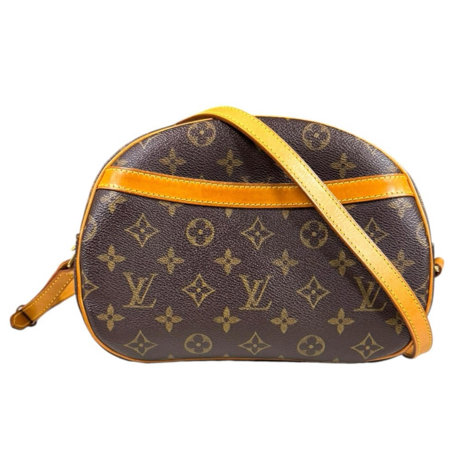 Shoulder Bag Monogram By Louis Vuitton: Shoulder Bag Monogram By Louis Vuitton The Louis Vuitton Monogram Shoulder Bag, crafted with timeless elegance, boasts the iconic monogram pattern in rich brown and gold hues. This exquisite piece
