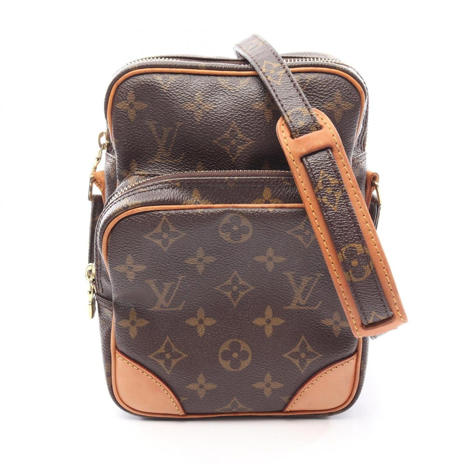 Shoulder Bag Coated Canvas Leather Louis Vuitton: Shoulder Bag Coated Canvas Leather Louis Vuitton Coated canvas and leather blend in rich brown tones, defining the classic design of this Louis Vuitton shoulder bag. The iconic monogram pattern adds