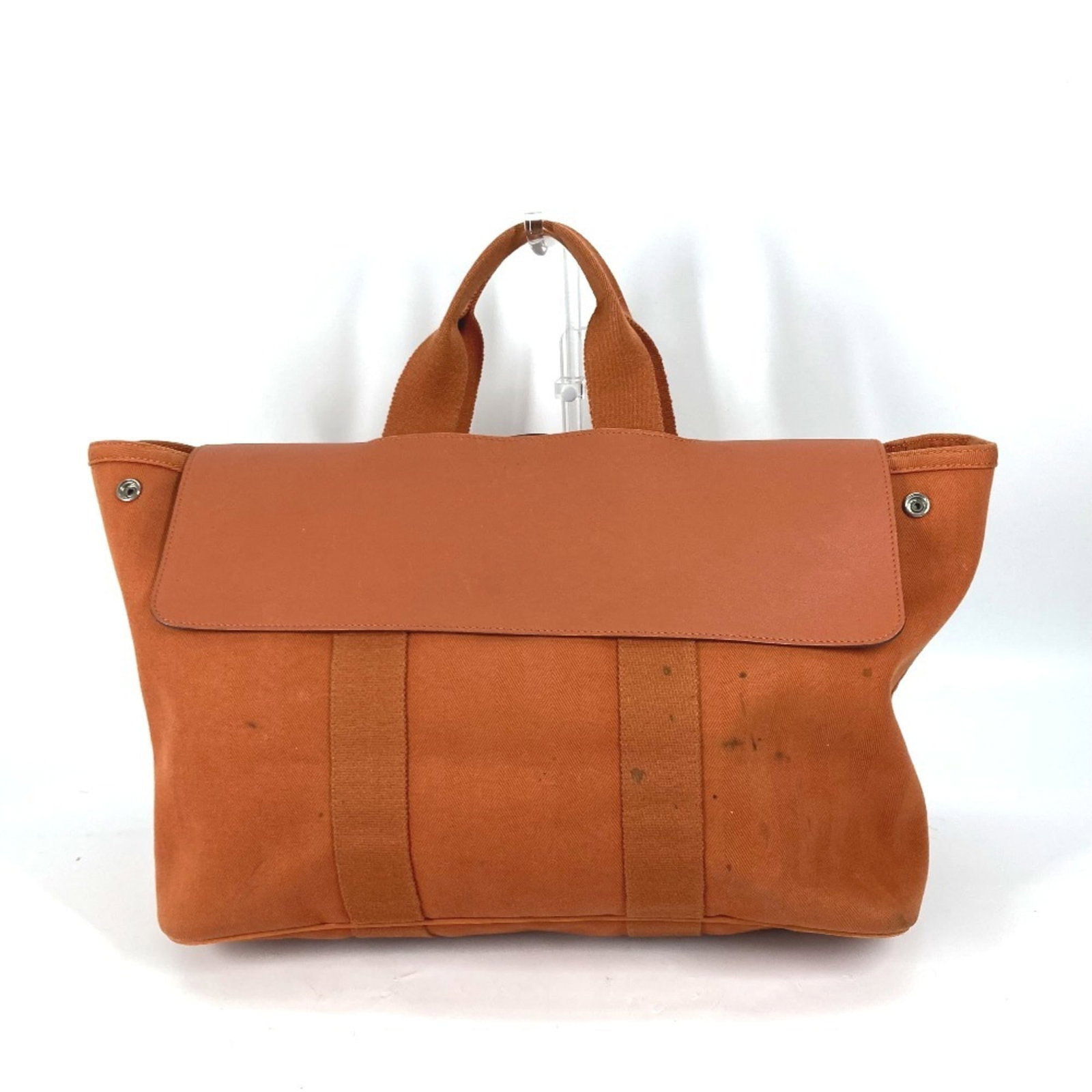 Canvas handbag leather pouch tote bag Hermes: Canvas handbag leather pouch tote bag Hermes Item Specifics: Brand: Hermes Type: Handbag, Pouch, Tote bag Material: Canvas , Leather Color: Orange Inner Pocket: Open pocket 1 Gender: Women Size (HxWxD