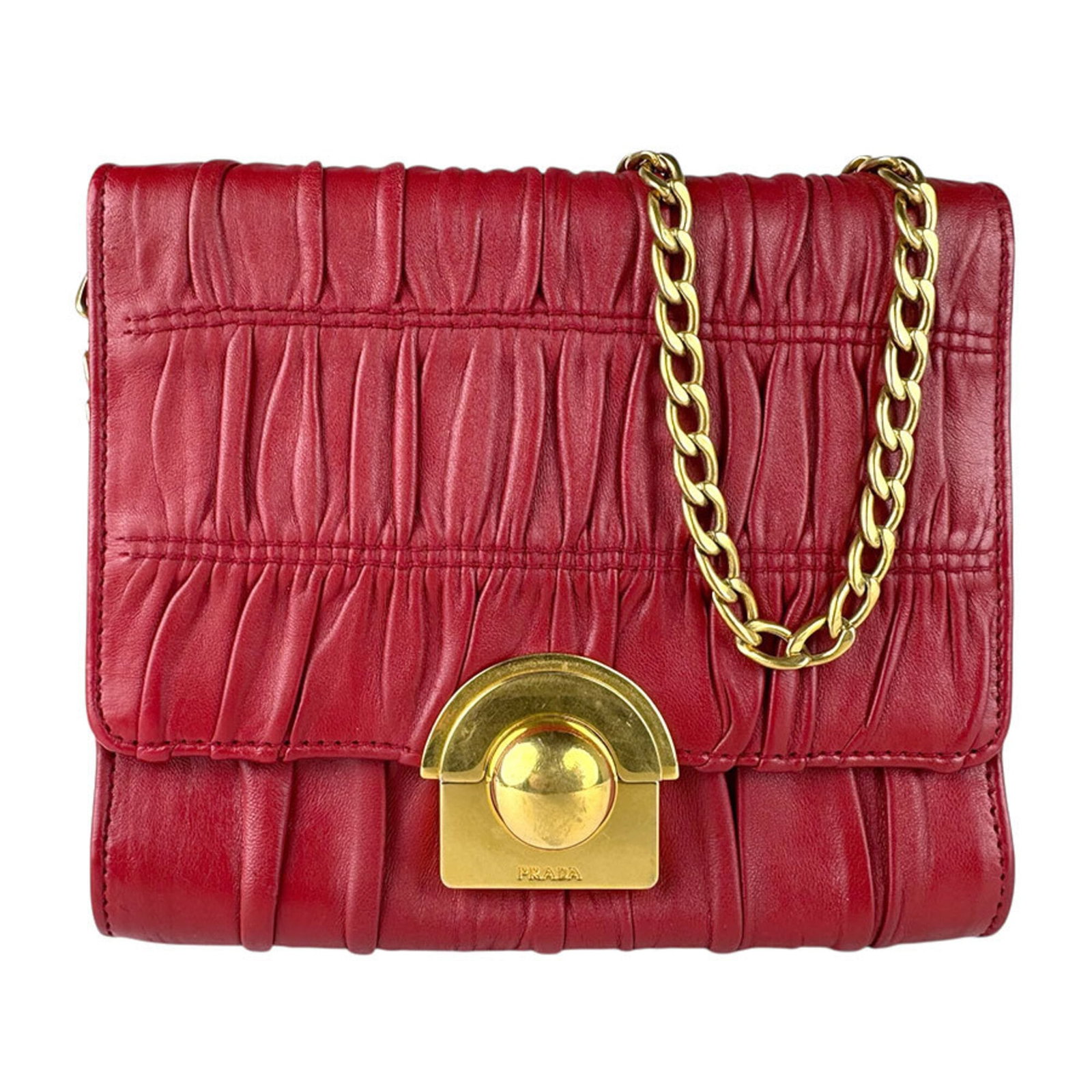 Shoulder Bag Leather by Prada: Shoulder Bag Leather by Prada Prada's iconic shoulder bag features rich, supple leather in a striking red color. Measuring just 16cm x 18cm x 4cm, this stylish accessory exudes understated elegance.