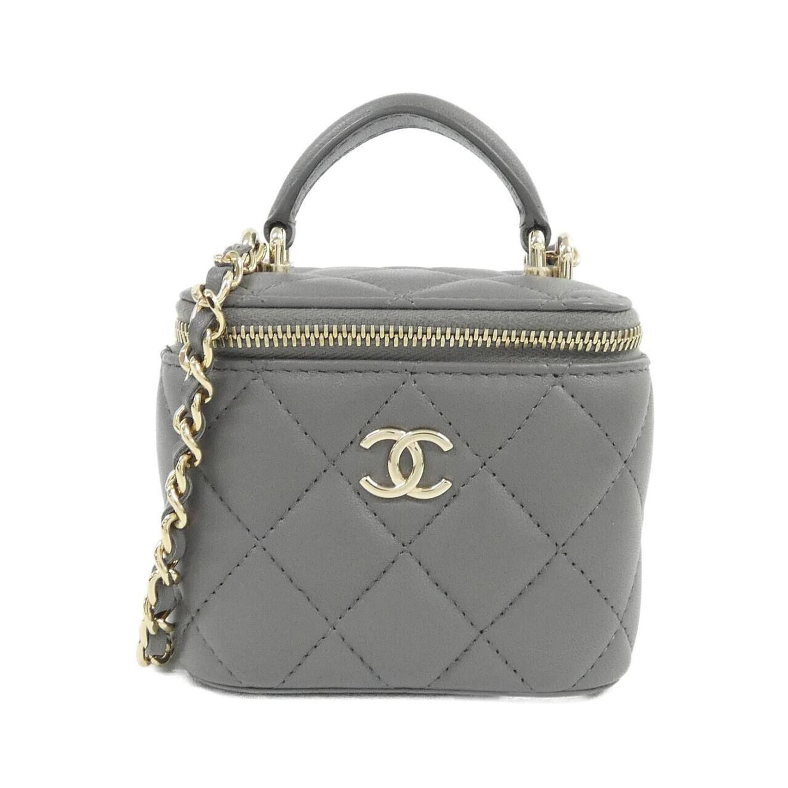 Leather Handbag Chanel: Leather Handbag Chanel Lamb leather handbag from Chanel, featuring gold hardware in a sleek gray color. Made with high-quality materials, this classic design measures 9cm x 10cm x 7cm and is perfect f