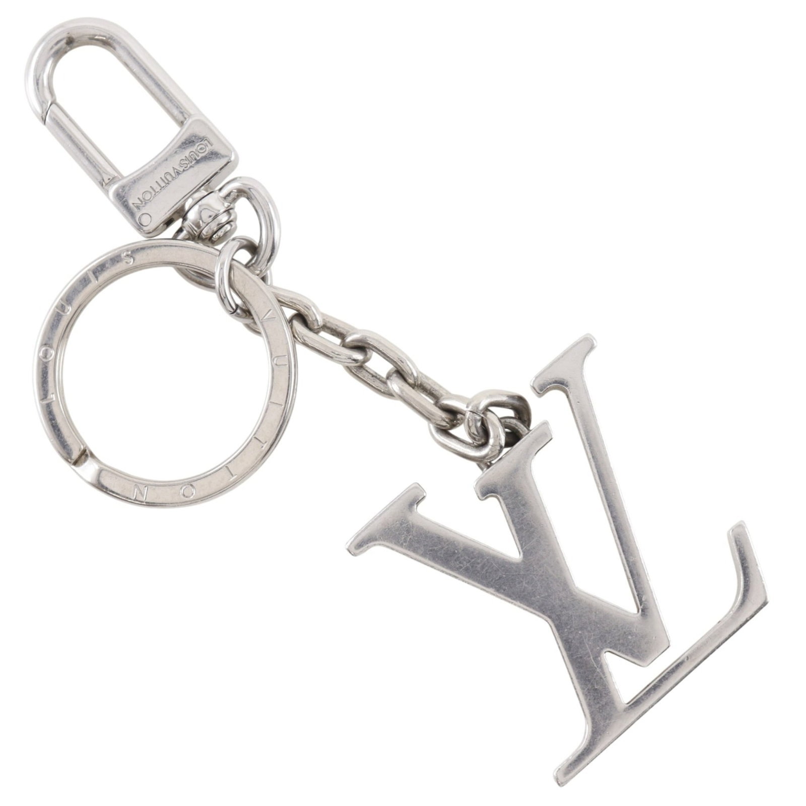 Louis Vuitton Keyring: Louis Vuitton Keyring Silver Louis Vuitton Keyring, measuring 13.3cm x 4.5cm x 8.00mm, features a sleek and sophisticated design that adds a touch of luxury to any keychain. Weighing in at 74g, this k