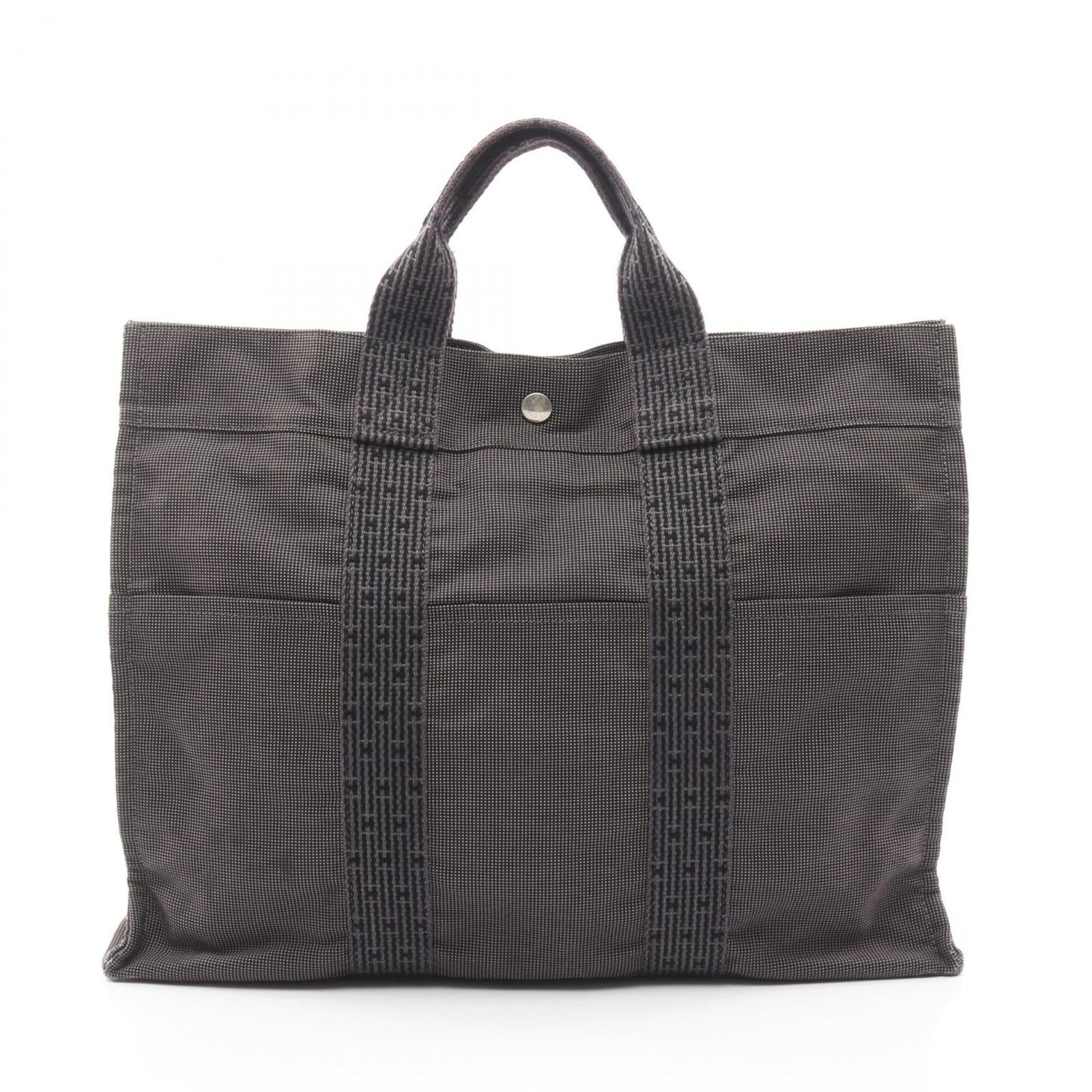 Hermes handbag nylon canvas tote bag: Hermes handbag nylon canvas tote bag Nylon canvas tote bag from Hermes, featuring a classic gray color and durable construction. Measuring 32cm x 42cm x 11cm, it provides ample space for daily