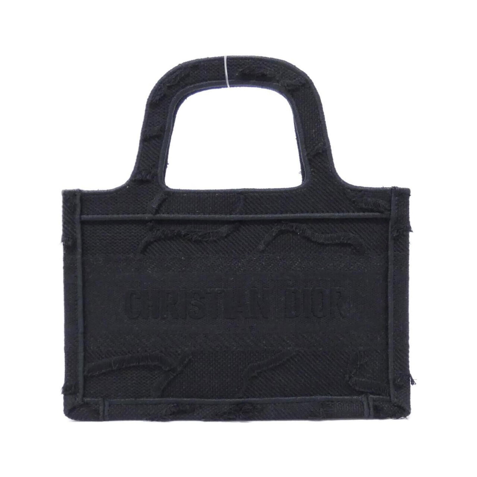 Canvas by Dior Christian: Canvas by Dior Christian Canvas by Dior Christian bears a signature. Made from canvas, this small bag measures 16cm x 23cm x 6cm and features a black color. Its compact size makes it a stylish