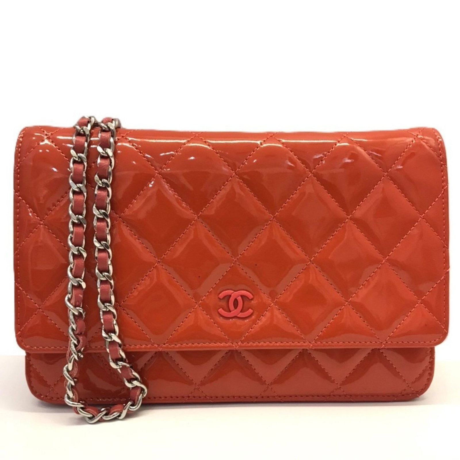 Chanel Chain/ Shoulder Wallet Patent Leather: Chanel Chain/ Shoulder Wallet Patent Leather Coral red patent leather gives this Chanel chain/shoulder wallet its vibrant pop, while the classic design ensures it will remain stylish for years to come