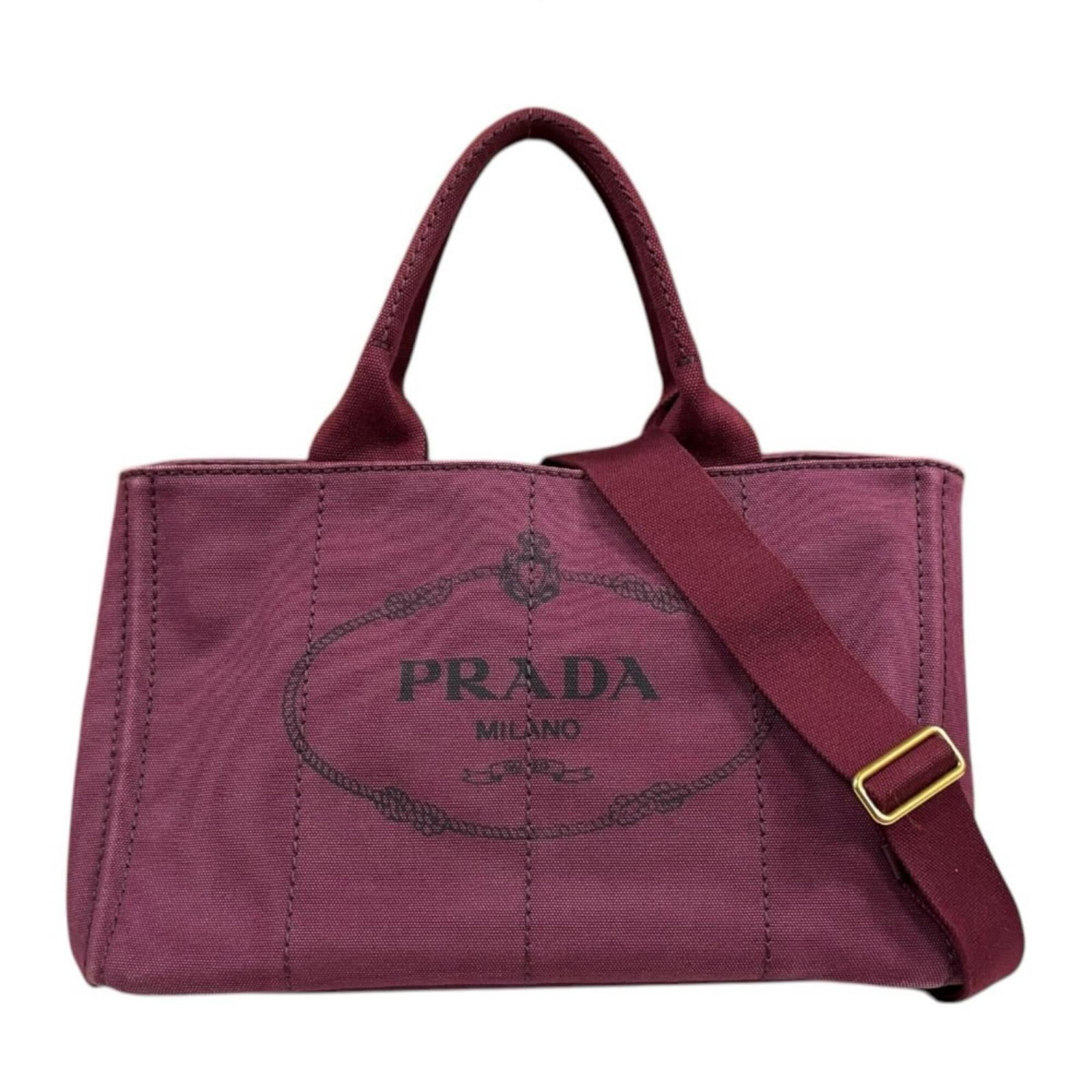 Shoulder Bag Canvas: Shoulder Bag Canvas Made in Italy, this Prada Canapa shoulder bag features a striking red canvas material and an open closure. The bag's size and weight are well-suited for everyday carrying, with adj