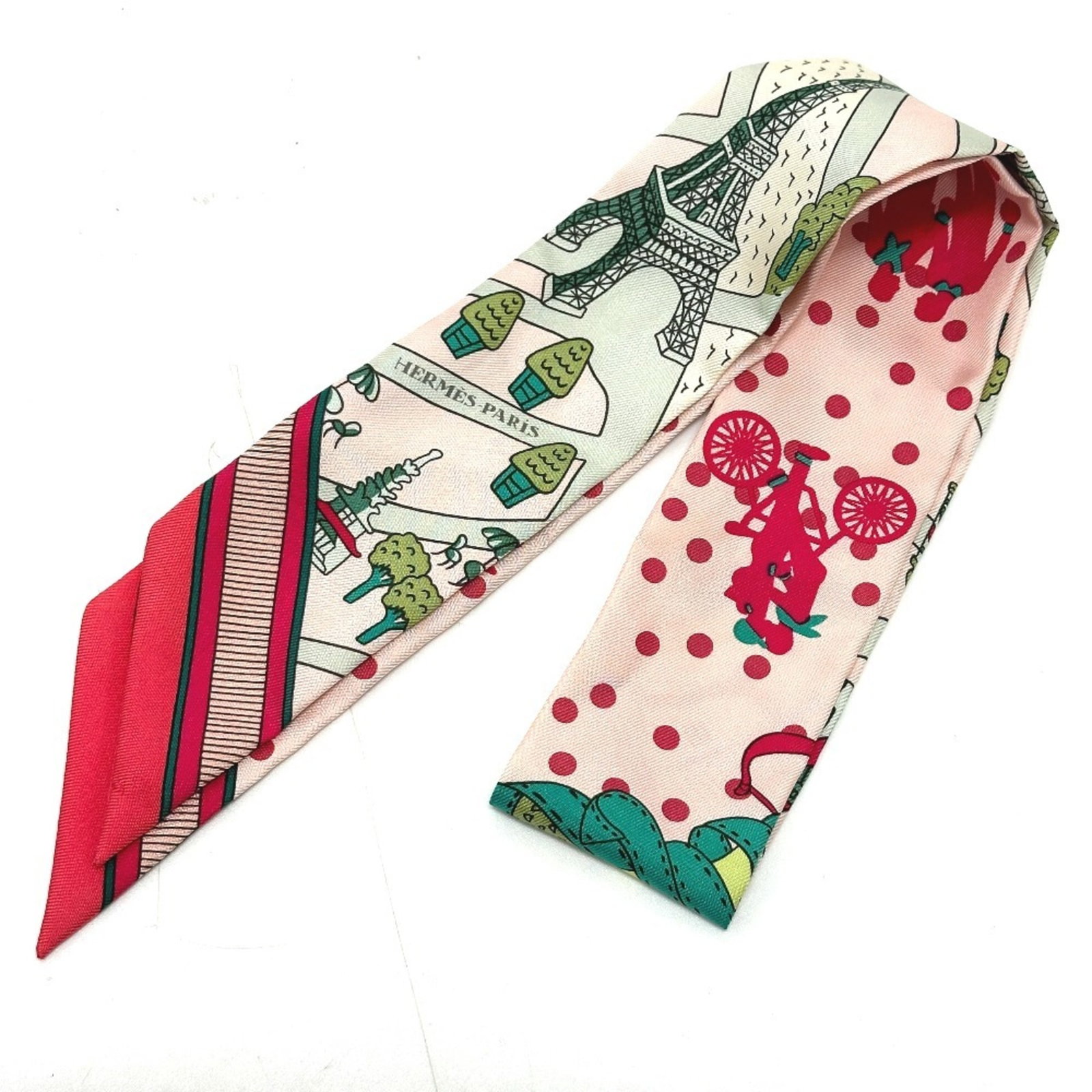 Hermes Silk Scarf: Hermes Silk Scarf The Herm?s Silk Scarf boasts its signature Twilly design, adding a touch of elegance to any outfit. Made from high-quality silk, the scarf measures 85cm x 5cm and comes in a