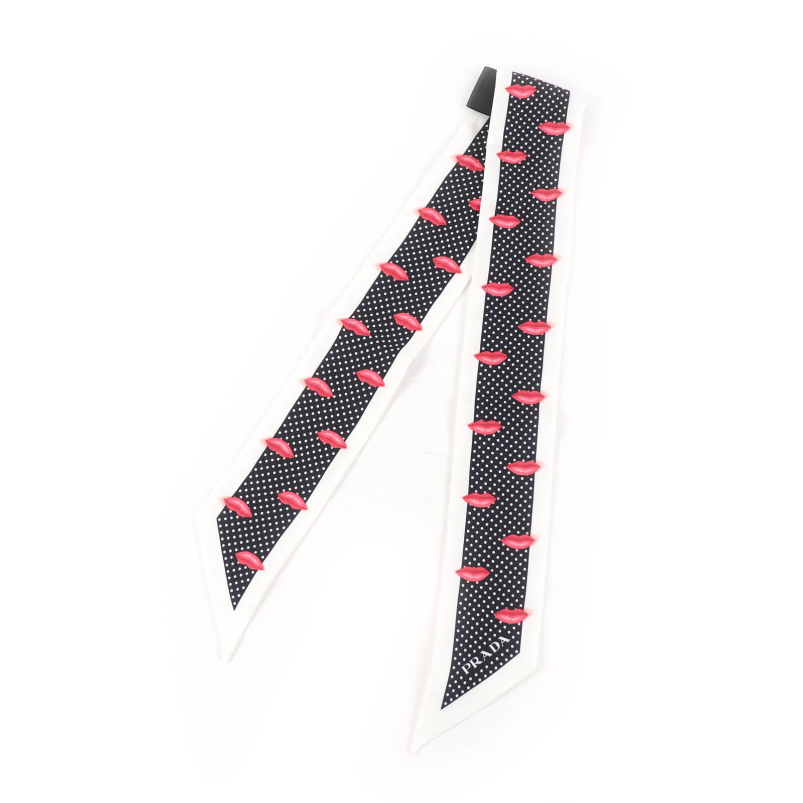 Prada Scarf Silk 100%: Prada Scarf Silk 100% Silk scarf from Prada, made entirely of 100% silk. Features a simple yet elegant design in black and white colors, with a compact size that measures 85cm x 6cm. Made in Italy.