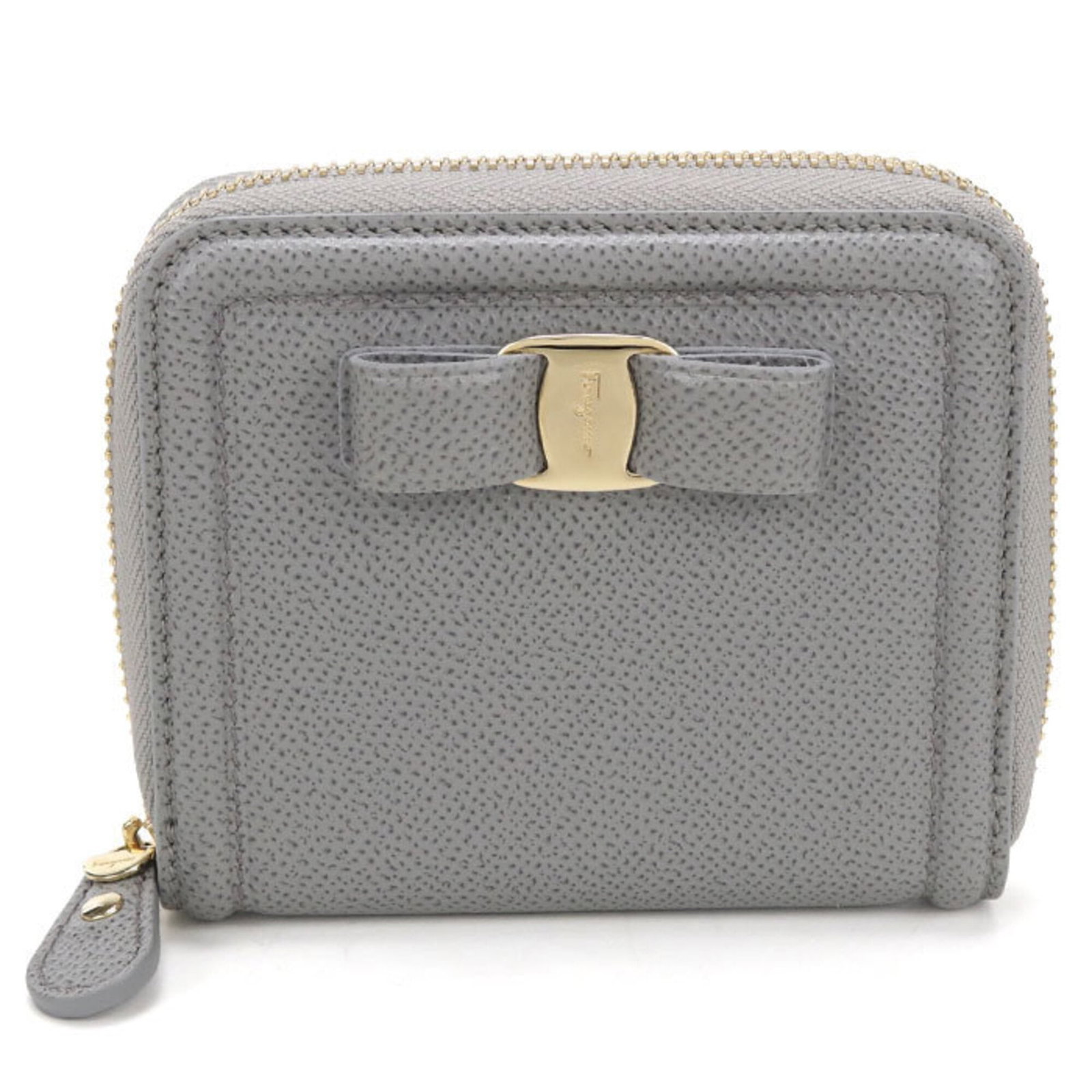 Salvatore Ferragamo Wallet (Bi-Fold) Leather: Salvatore Ferragamo Wallet (Bi-Fold) Leather The Salvatore Ferragamo bi-fold leather wallet features high-quality calfskin leather in a sleek gray color. Made with attention to detail, its compact
