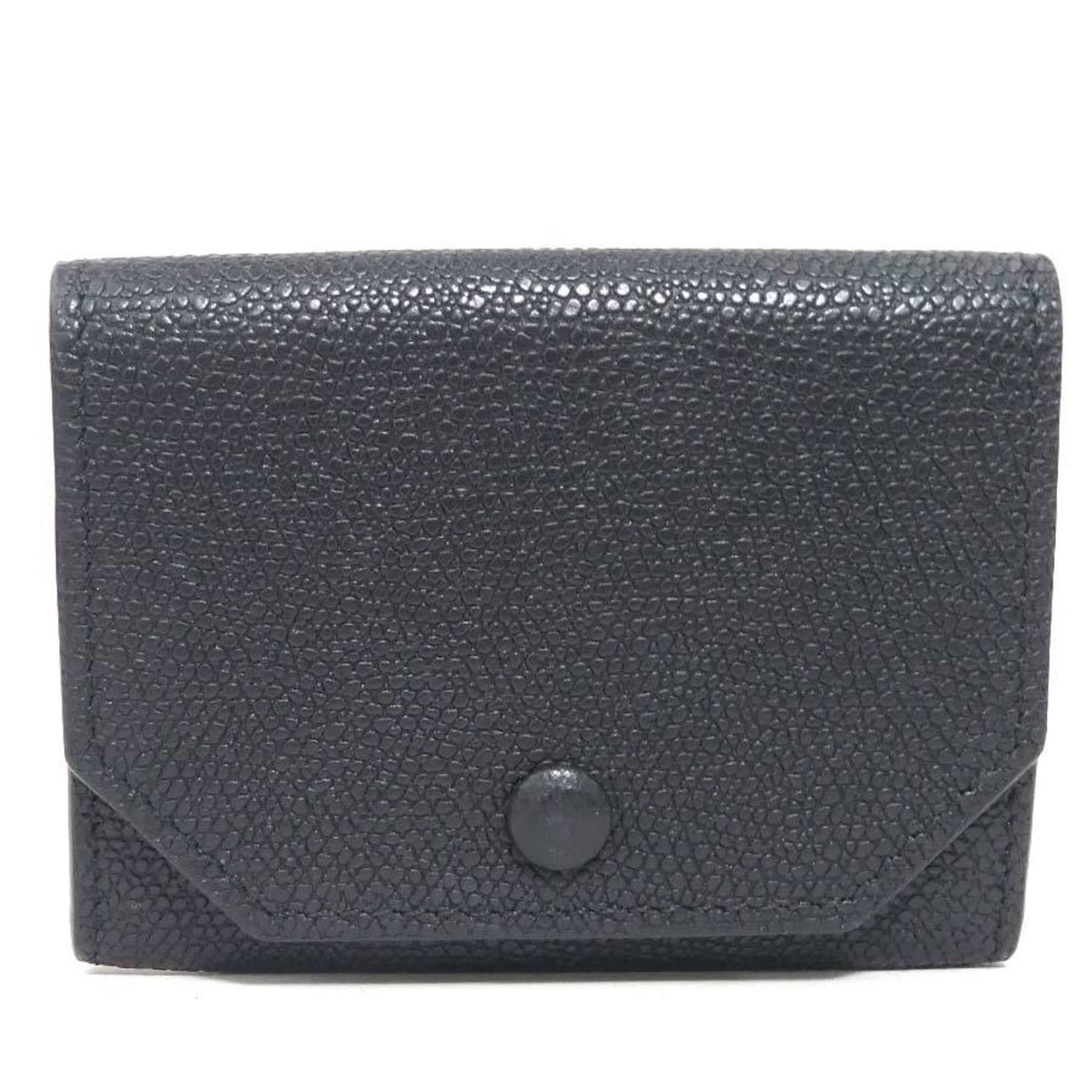 Valextra Coin Purse/ Coin Case Leather: Valextra Coin Purse/ Coin Case Leather The Valextra Coin Purse/ Coin Case Leather is a sleek and sophisticated accessory from Italy, crafted from high-quality black leather. Measuring just 7cm x