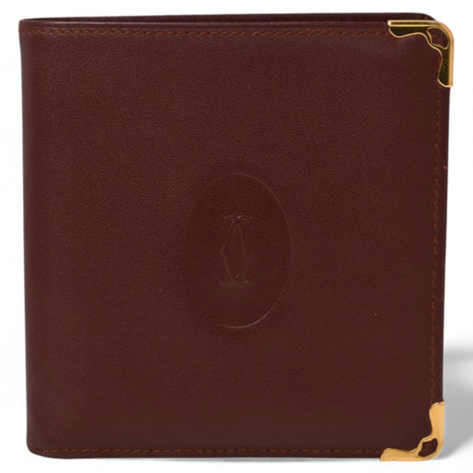 Cartier Wallet (Bi-Fold): Cartier Wallet (Bi-Fold) Cartier's bi-fold wallet boasts sleek lines and classic design, crafted from high-quality materials. Its Bordeaux finish adds a touch of sophistication, while the open snap fa
