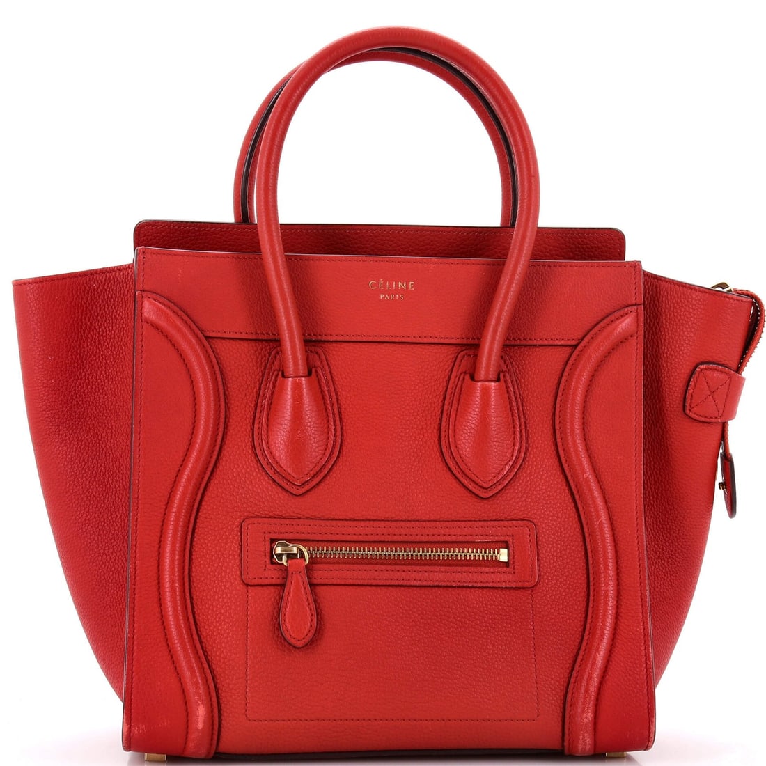 Celine grainy leather luggage bag: Celine grainy leather luggage bag Red grainy leather micro Celine luggage bag with gold hardware, featuring a classic totes style and durable exterior material. The bag's exterior shows signs of wear,