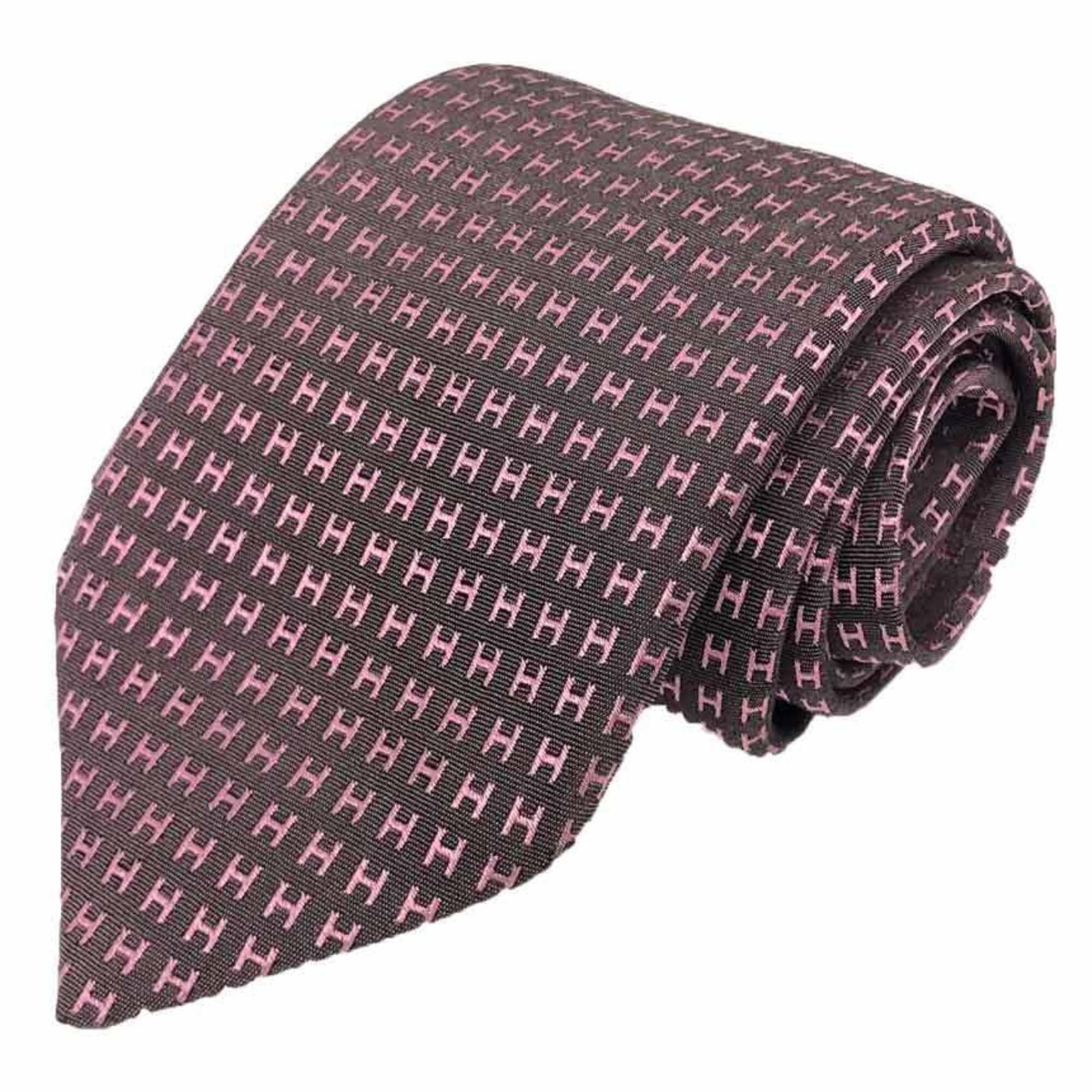 Hermes Cravat Silk: Hermes Cravat Silk Silk cravat from the renowned French fashion house Hermes, crafted with a vibrant pink or purple hue and measuring 8cm in width. This elegant accessory showcases the brand's signatu