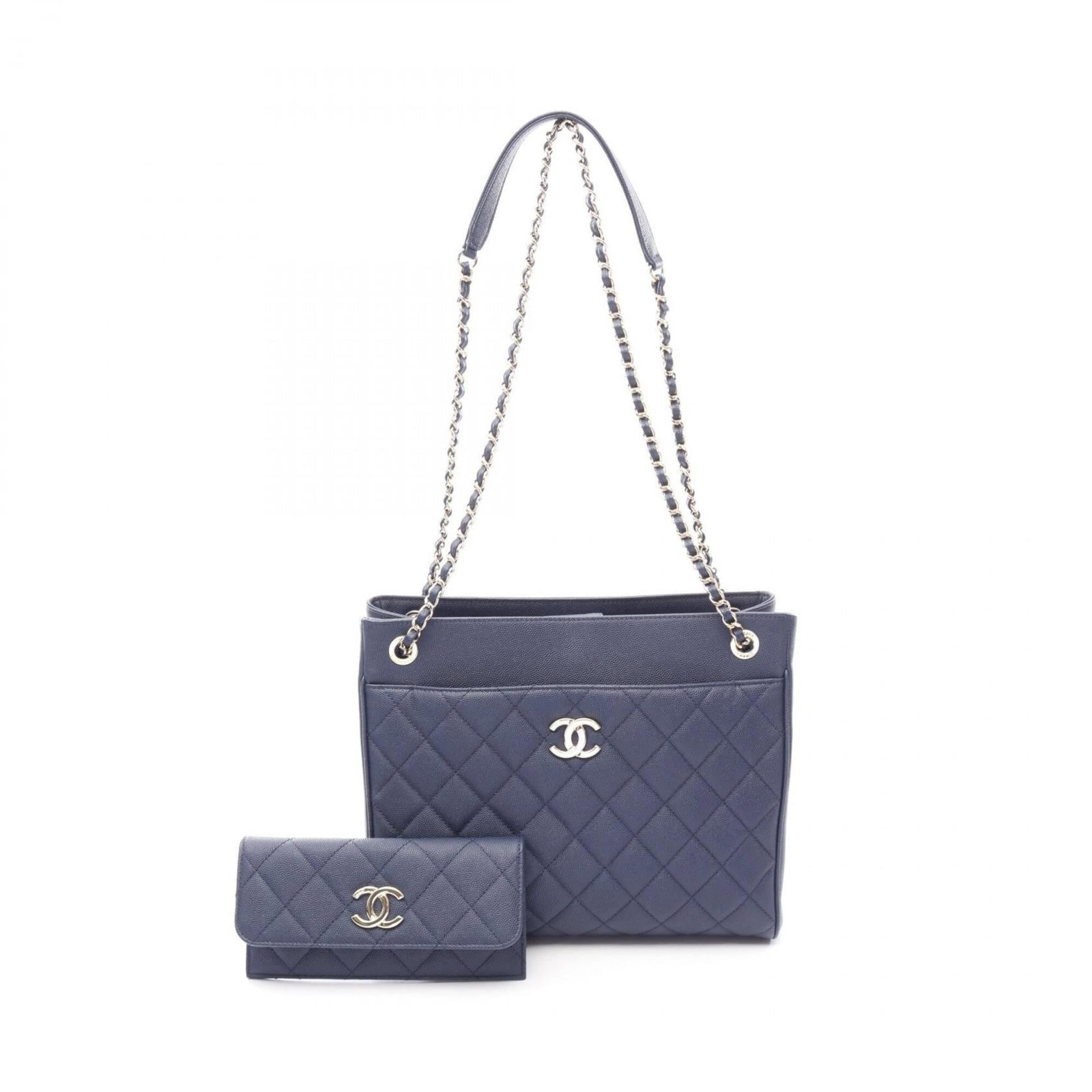 Calfskin handbag bag shoulder Chanel: Calfskin handbag bag shoulder Chanel Calfskin handbag bag shoulder Chanel features a classic design with a navy grained Calfskin material, measuring 23cm x 28cm x 10cm. The signature Chanel style is