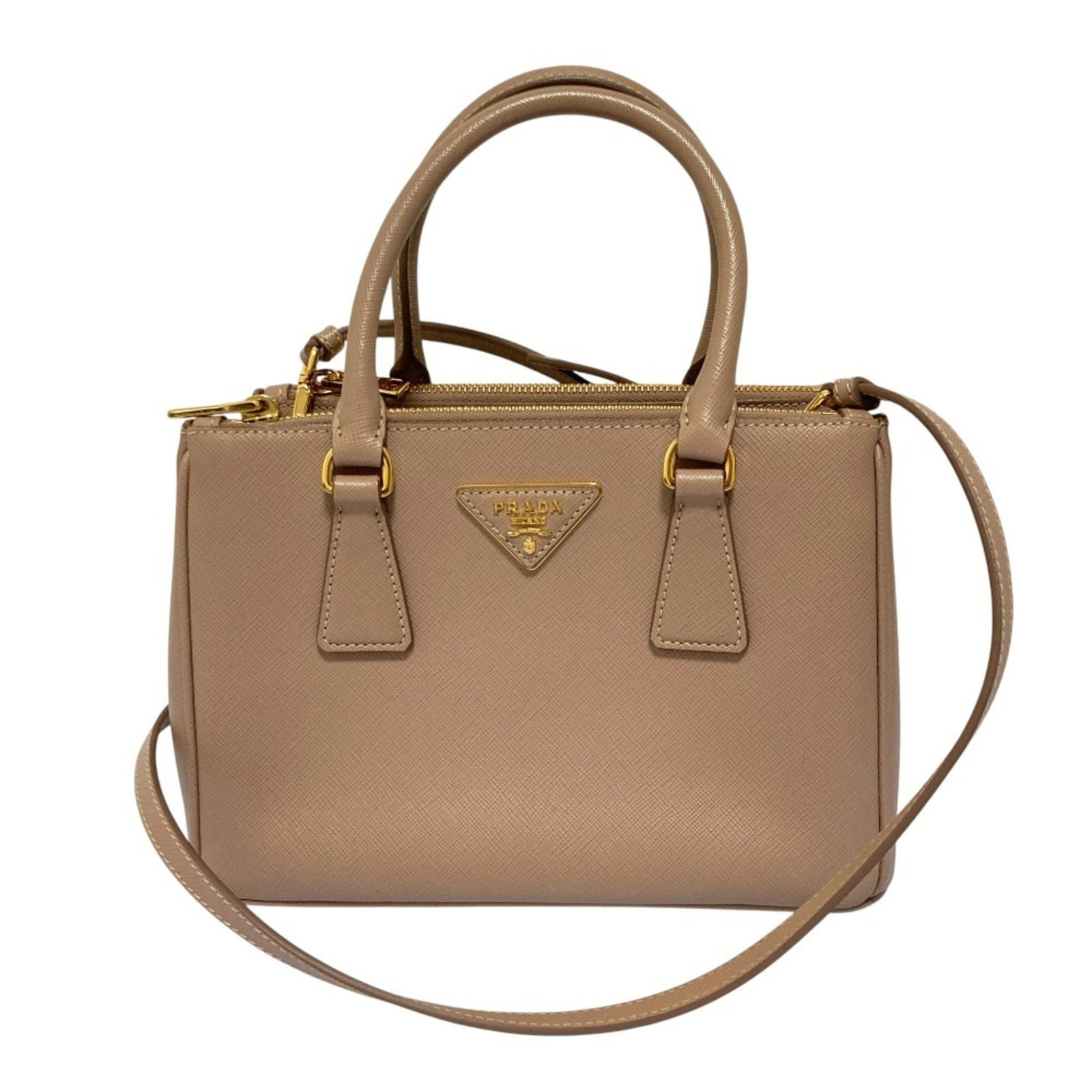 Shoulder Bag Leather by Prada: Shoulder Bag Leather by Prada Light pink leather shoulder bag with classic design. Made from high-quality material, the bag measures 16.5cm x 23.5cm x 11cm and features a timeless style that suits wom
