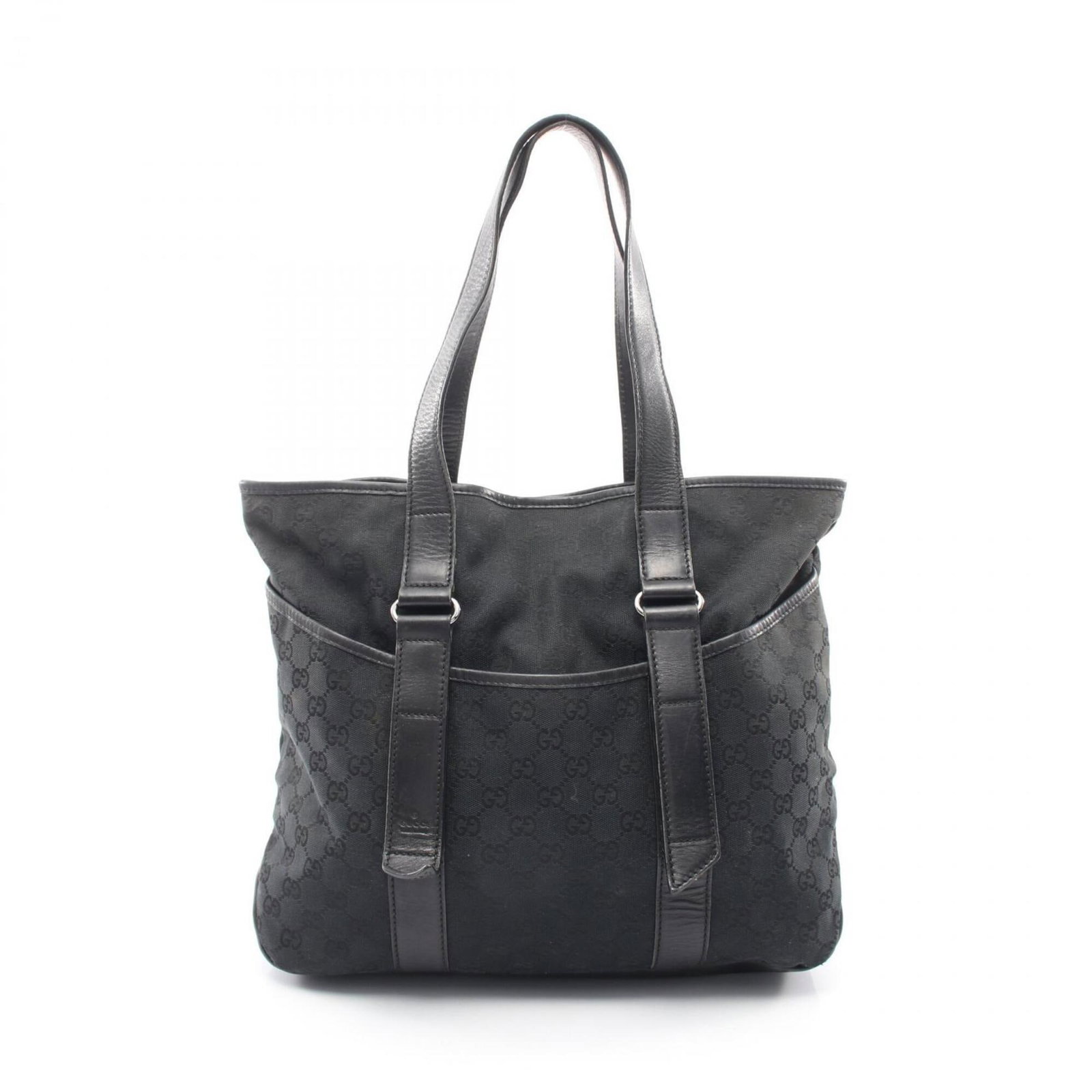 Canvas leather handbag tote gucci: Canvas leather handbag tote gucci Canvas leather handbag tote from Gucci, featuring a black canvas exterior and leather accents. The bag measures 31cm x 34cm x 12cm and has a classic design that showc