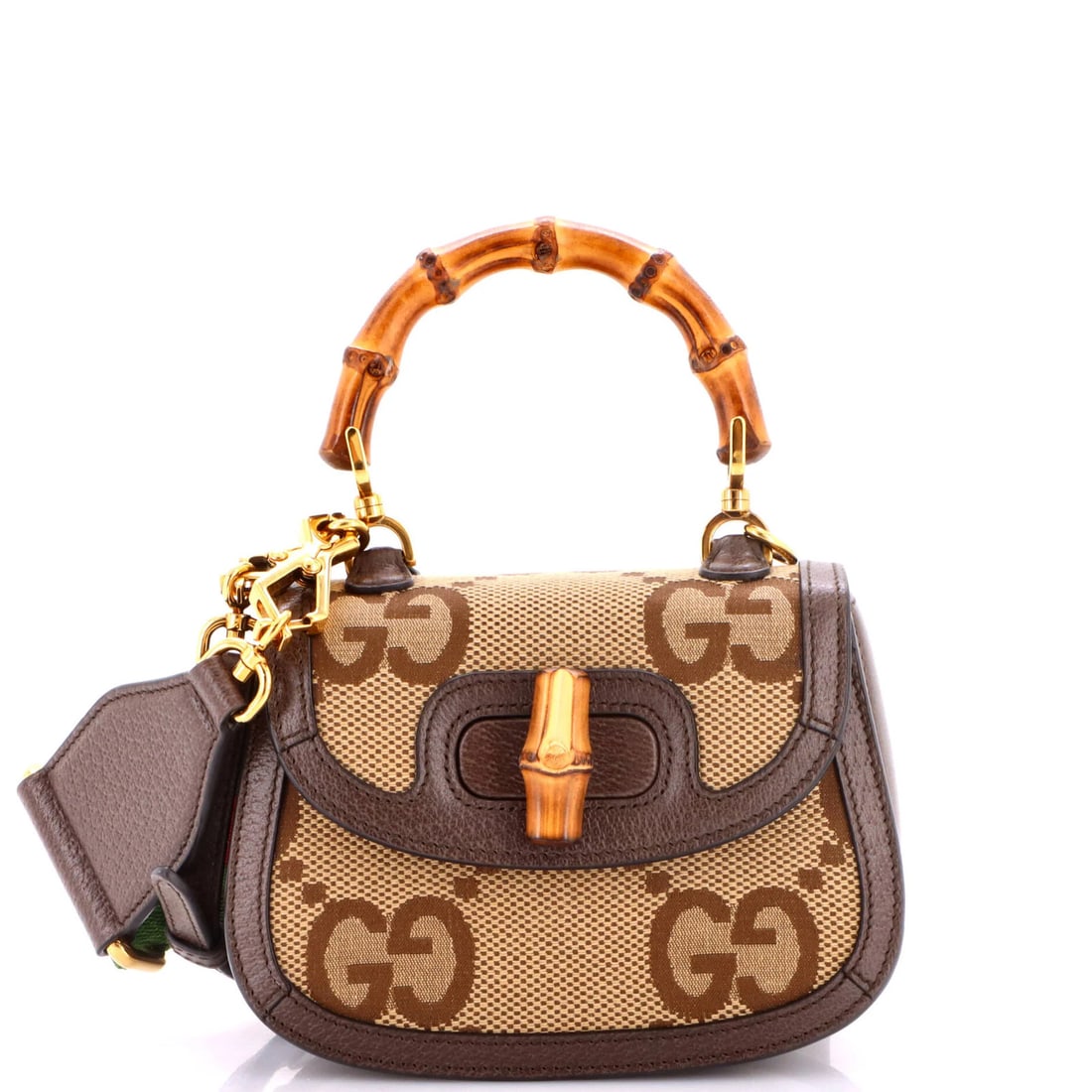Gucci 1947 bamboo top bag mini jumbo handle GG canvas: Gucci 1947 bamboo top bag mini jumbo handle GG canvas The Gucci 1947 bamboo top bag mini jumbo handle GG canvas features a unique blend of classic and modern design. This stylish cross-body bag