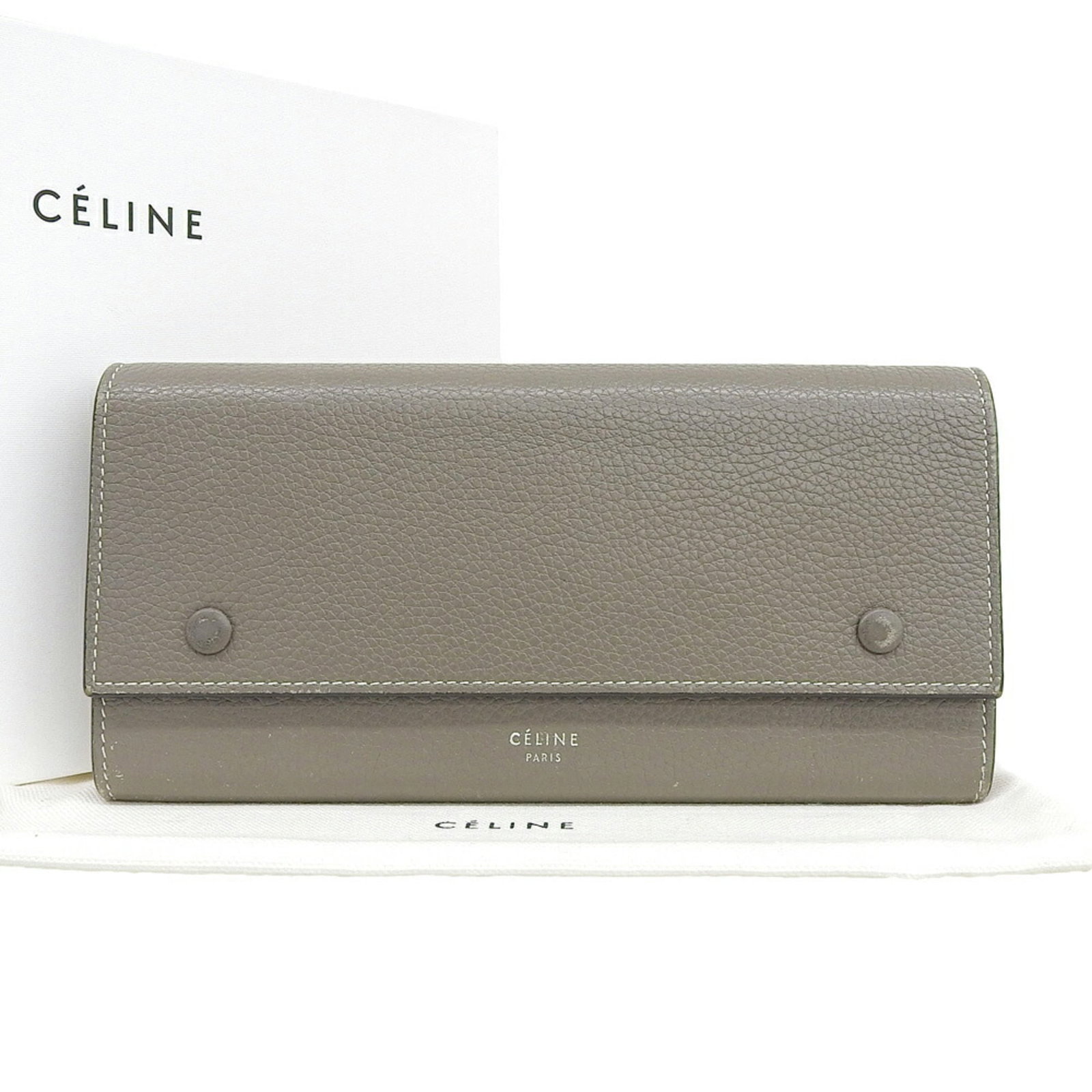 Celine Long Wallet (Tri-Fold) Leather: Celine Long Wallet (Tri-Fold) Leather Gray Celine Long Wallet (Tri-Fold) Leather, made from high-quality Italian leather, features a classic tri-fold design with clean lines and a timeless aesthetic.