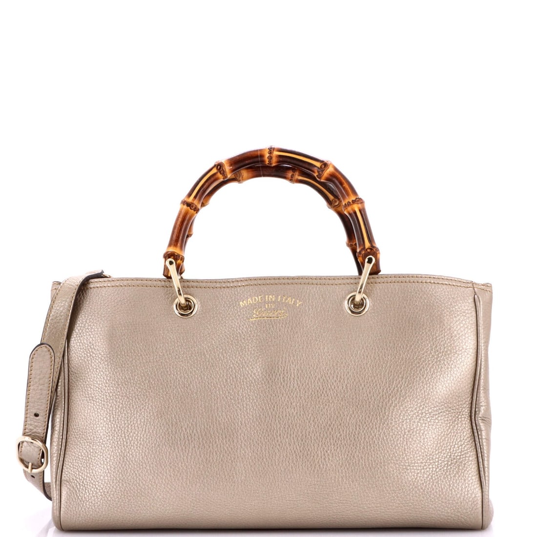 Gucci leather tote shopper bamboo medium: Gucci leather tote shopper bamboo medium Heavy corner wear, scuffs, cracking, edge wear, and minor creases characterize this Gucci leather tote shopper bamboo medium. The metallic exterior and neutral