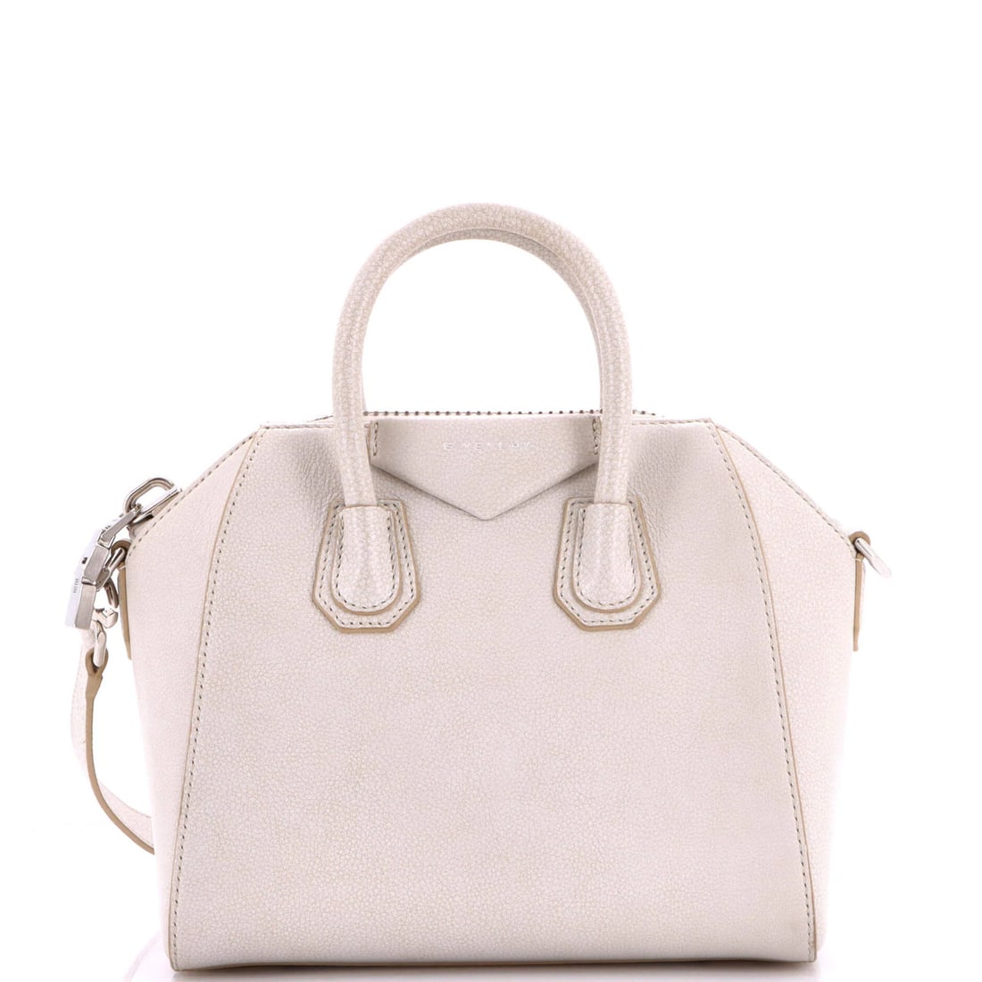 Givenchy Mini Leather Antigona Bag: Givenchy Mini Leather Antigona Bag The Givenchy Mini Leather Antigona Bag features neutral leather exterior with minor creases, a cross body design, and silver hardware. With its compact size and