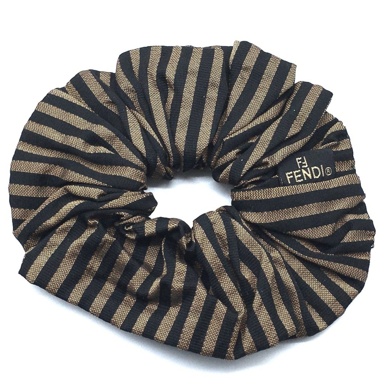 Canvas Scrunchie by Fendi: Canvas Scrunchie by Fendi Canvas Scrunchie by Fendi - A stylish accessory from the renowned Italian fashion house, featuring canvas material and available in two neutral tones. This scrunchie bears a 