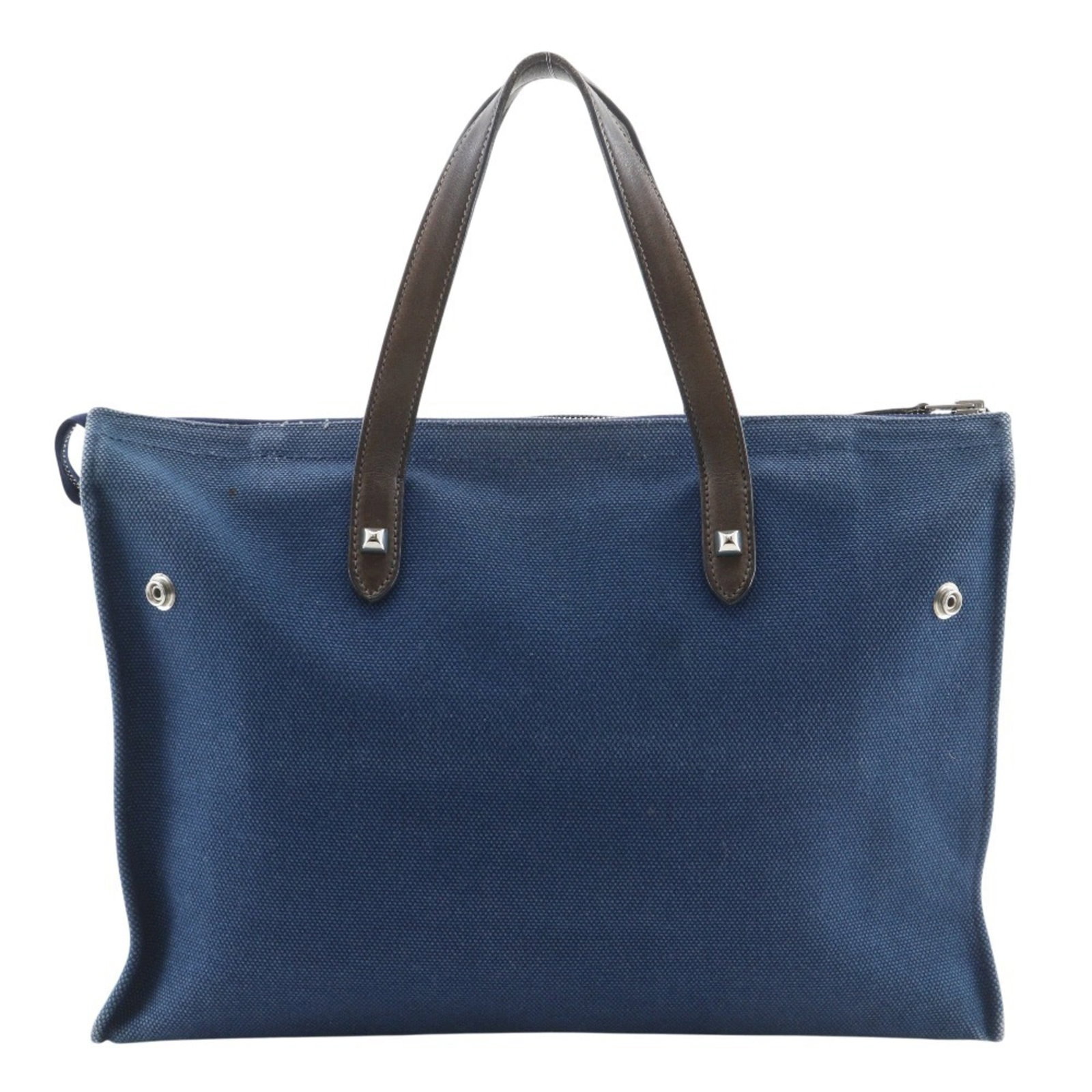Handbag Canvas by Hermes: Handbag Canvas by Hermes Canvas by Hermes features a navy color and measures 25cm x 35cm x 10cm. This handbag's canvas material provides a unique texture, while its size makes it easy to carry. The ba