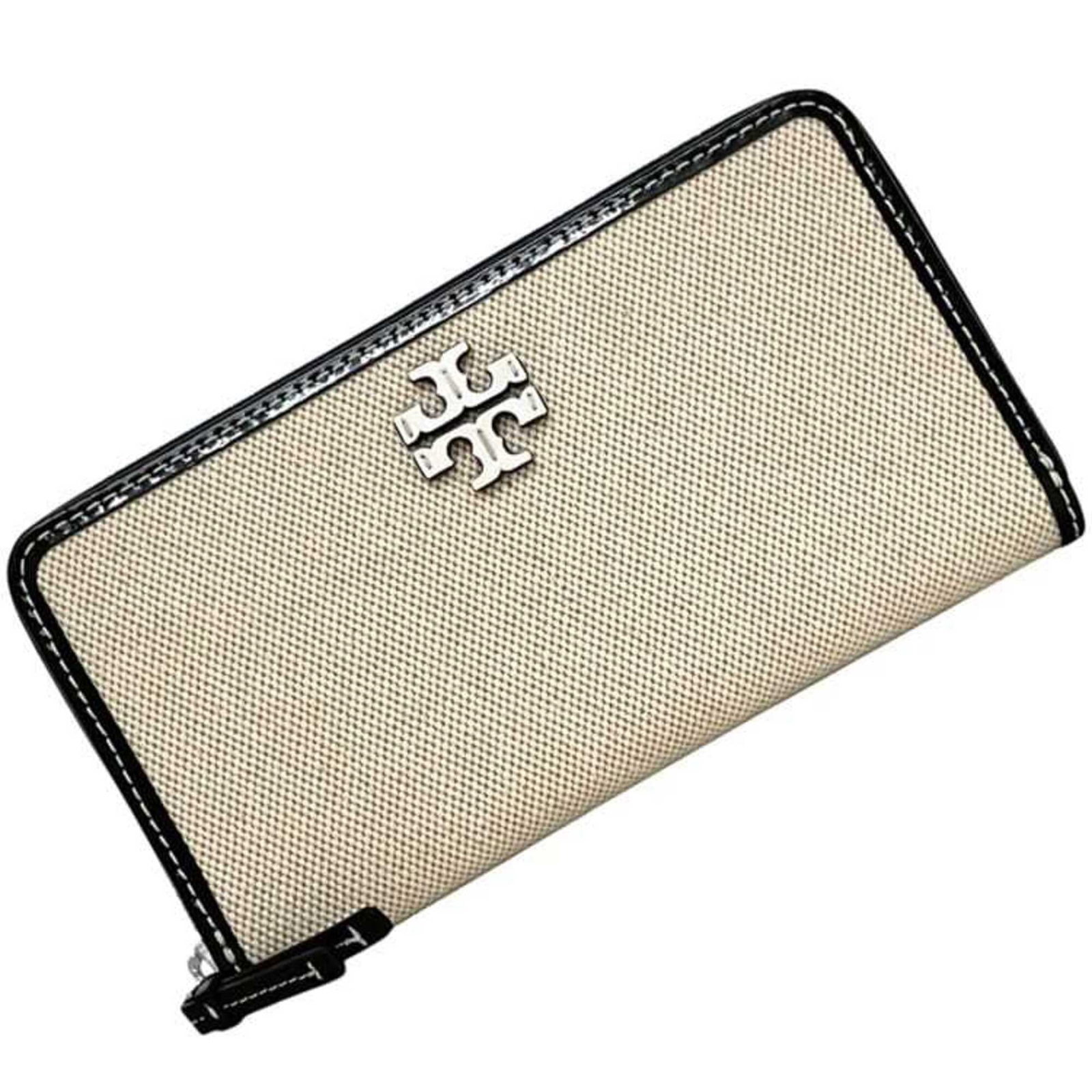 Tory Burch Long Wallet (Bi-Fold) Canvas Leather: Tory Burch Long Wallet (Bi-Fold) Canvas Leather Canvas and leather blend in sleek design, making this bi-fold wallet from Tory Burch a stylish choice for everyday carry. The black and white color opti