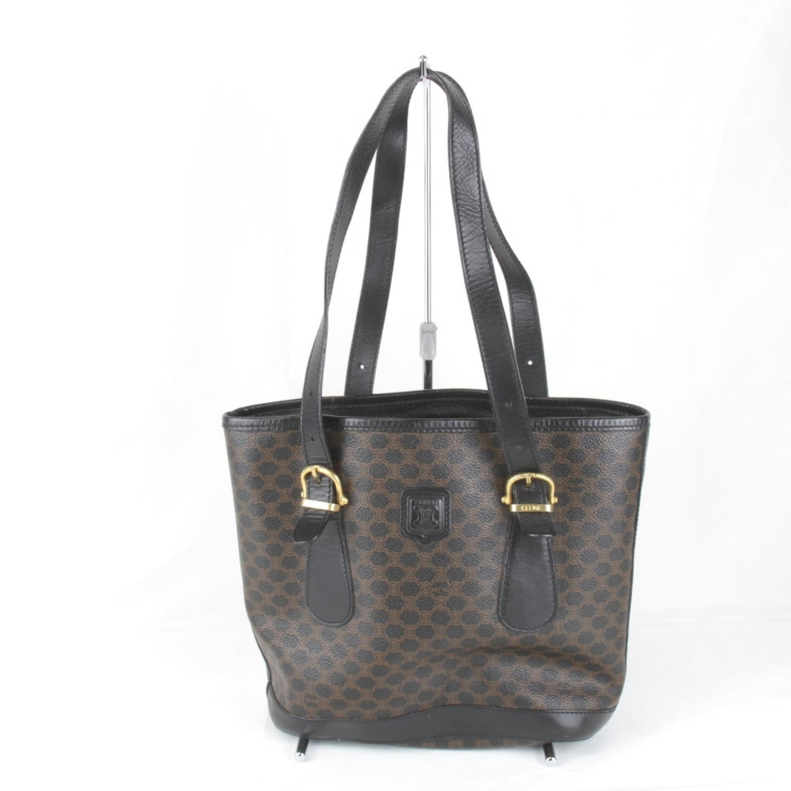 Handbag of PVC by Celine: Handbag of PVC by Celine Black PVC handbag by Celine, measuring 23cm x 29cm x 9cm and weighing 600g. The bag features a sturdy handle length of 60cm. Made from high-quality PVC material. Item Specific