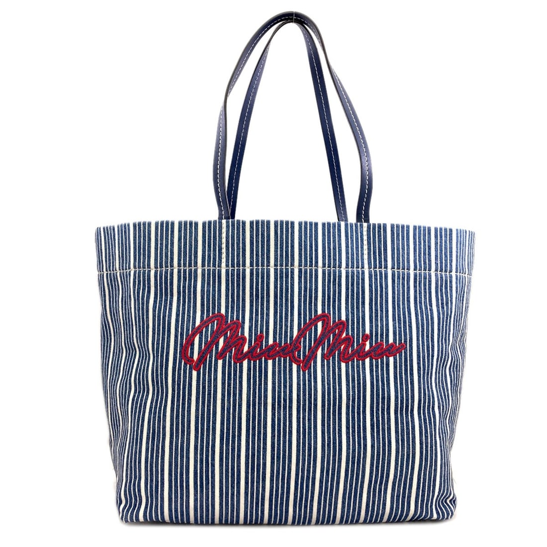 Stripe tote bag denim: Stripe tote bag denim Blue denim tote bag with a striped design, made from high-quality denim material. This stylish and functional bag features a classic blue exterior color that's perfect for