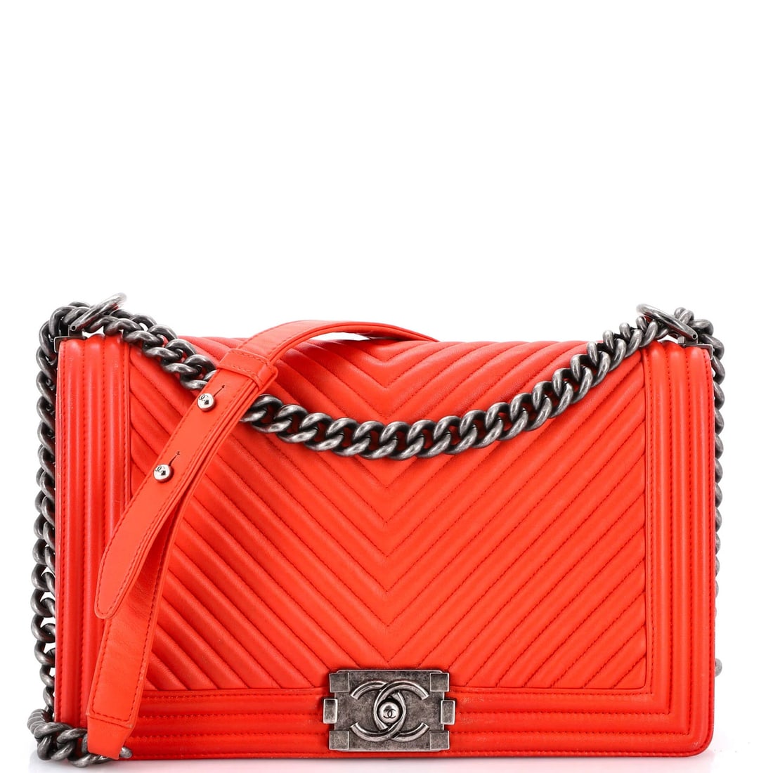 Calfskin Chevron Boy Flap Bag Medium New: Calfskin Chevron Boy Flap Bag Medium New Calfskin Chevron Boy Flap Bag in vibrant red, featuring the iconic Chanel design. This medium-sized bag boasts a classic boy flap style with a signature chevro
