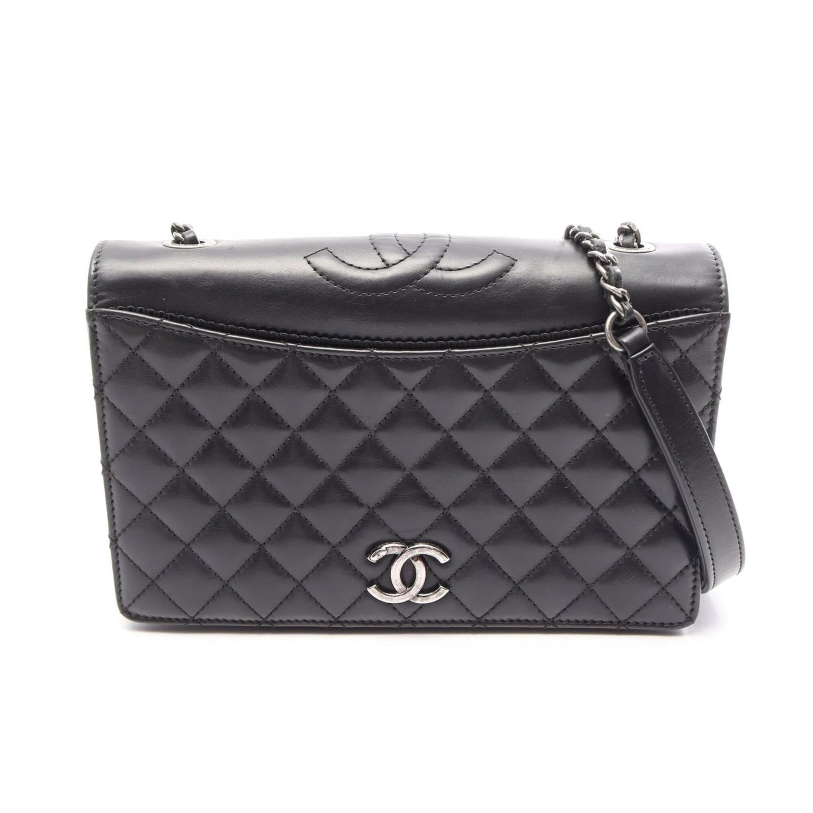 Chanel Handbag Shoulder Bag Leather: Chanel Handbag Shoulder Bag Leather The Chanel Handbag Shoulder Bag Leather features sleek, timeless design in black lambskin leather. With its compact size and classic style, it's perfect for