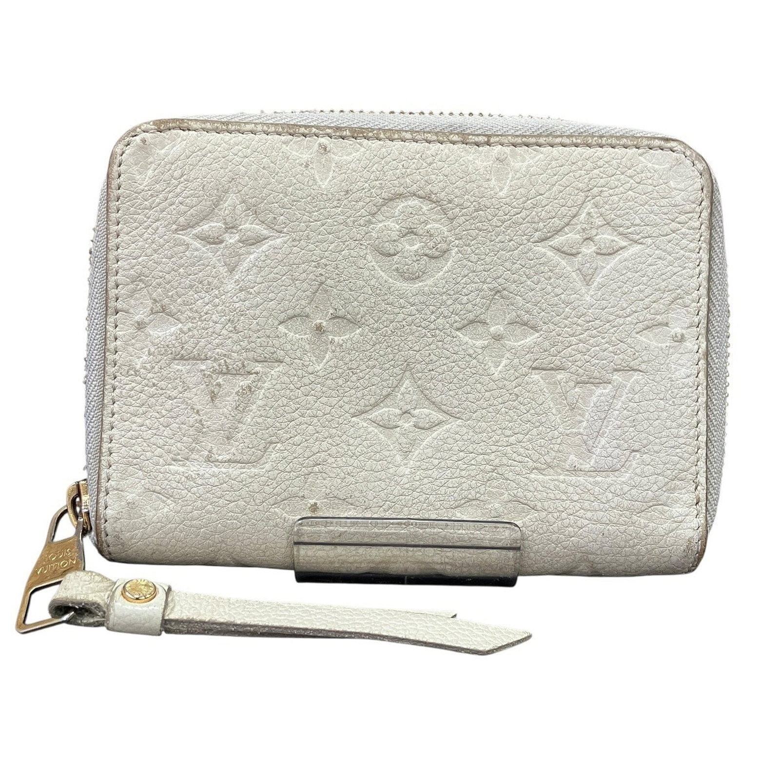 Louis Vuitton Wallet (Bi-Fold) Monogram Empreinte Leather: Louis Vuitton Wallet (Bi-Fold) Monogram Empreinte Leather Monogram Empreinte Leather adds an iconic touch to this bi-fold wallet from Louis Vuitton, featuring the signature LV pattern in Neige color.