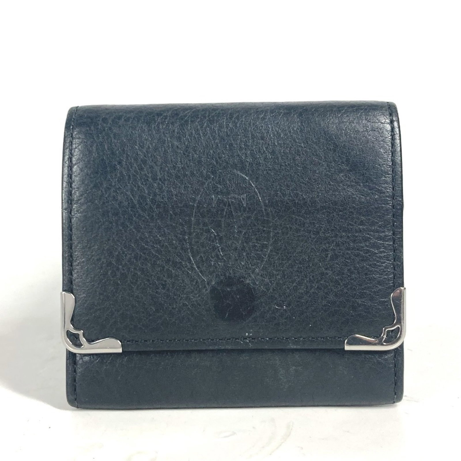 Cartier Coin Purse/ Coin Case Leather: Cartier Coin Purse/ Coin Case Leather Cartier Coin Purse/ Coin Case Leather is a sleek and sophisticated accessory made from high-quality black leather. Measuring 7.5cm x 8cm, it features a classic