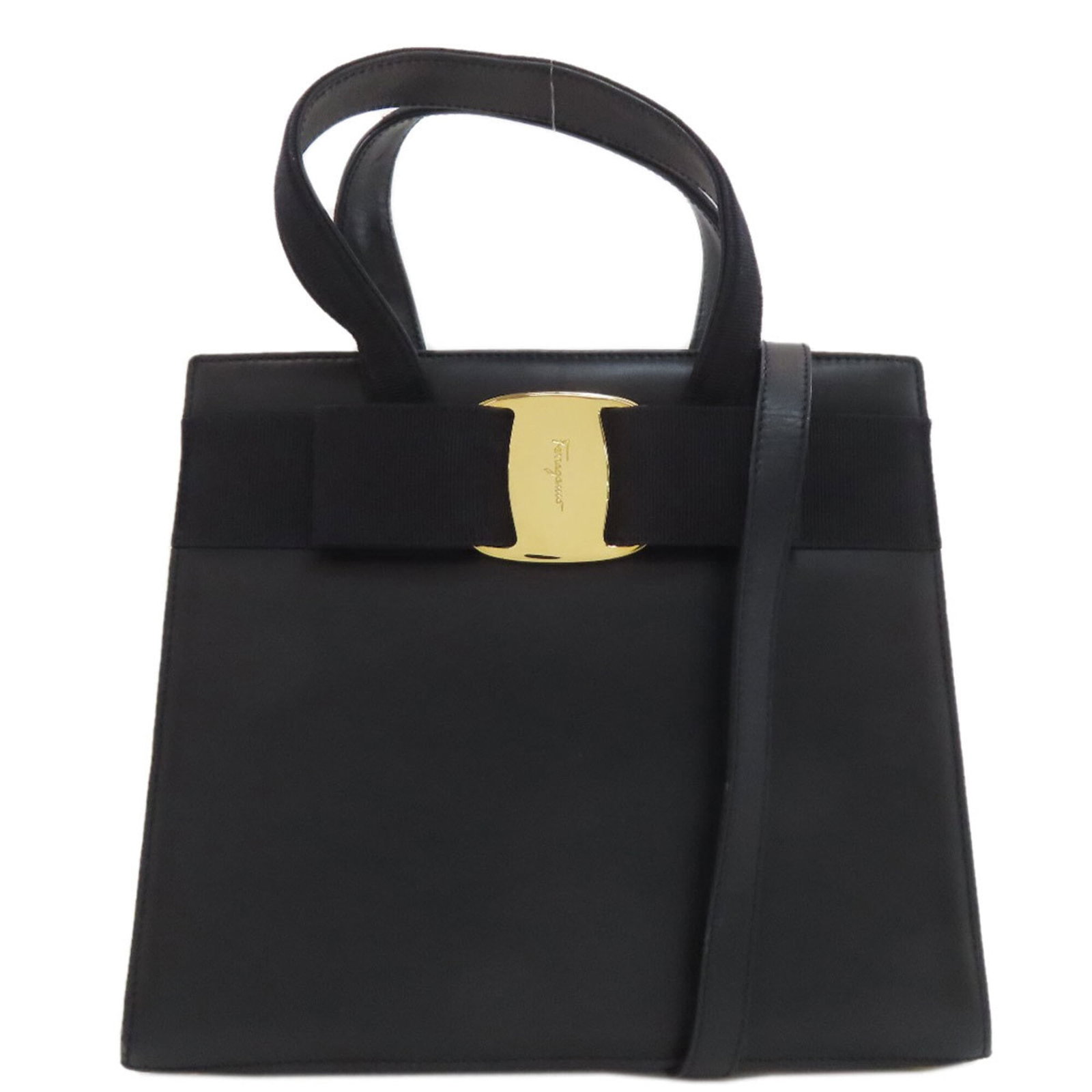 Salvatore Ferragamo Handbag Leather: Salvatore Ferragamo Handbag Leather Navy black Salvatore Ferragamo handbag made from high-quality leather, featuring a classic design with a shoulder strap and measuring 20.5cm x 23cm x 9.5cm in