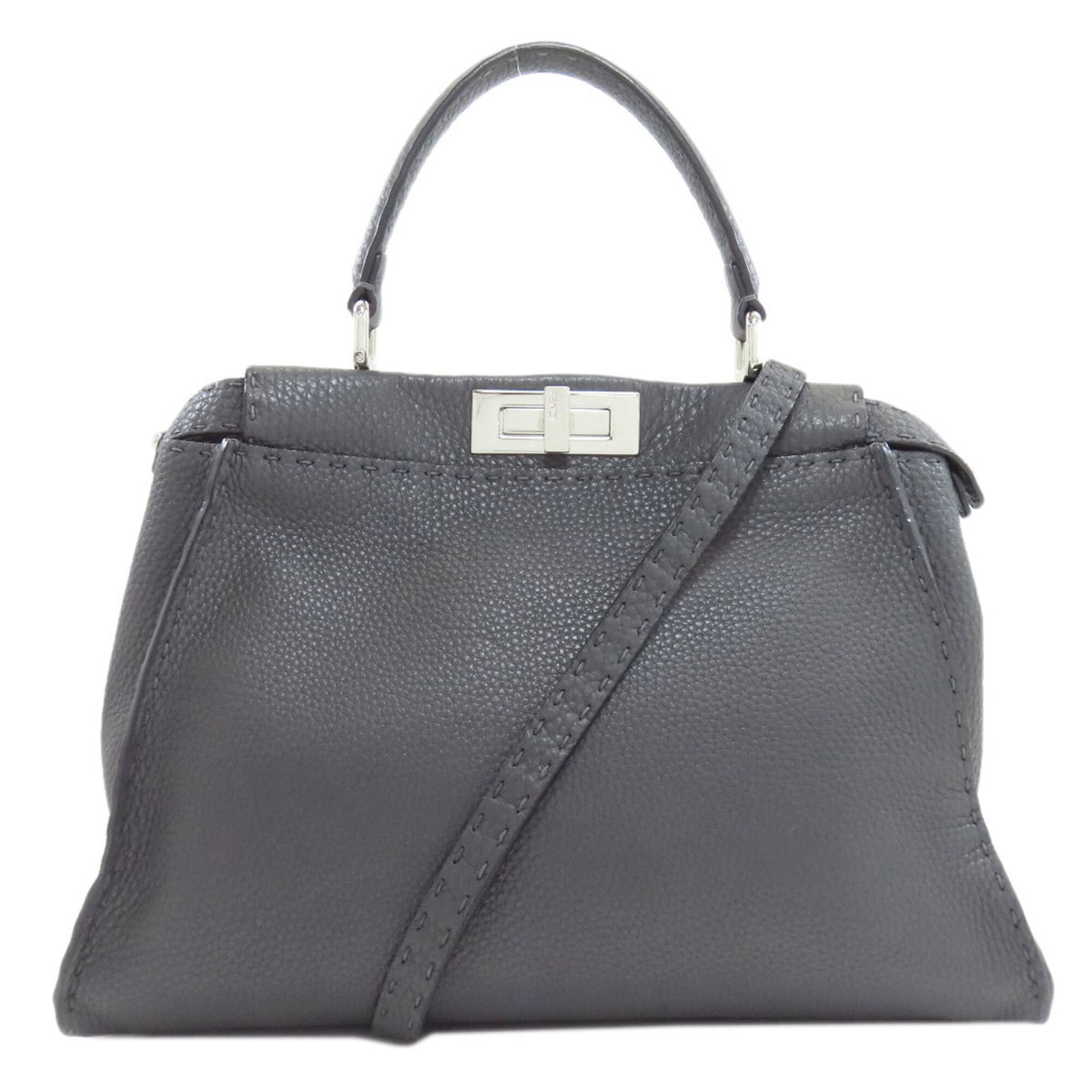 Fendi Handbag Leather: Fendi Handbag Leather Calfskin Fendi Peekaboo Handbag in Gray. This luxurious handbag features turn lock closure, shoulder strap, and measures 24cm x 33.5cm x 13.5cm. Made from high-quality leather,