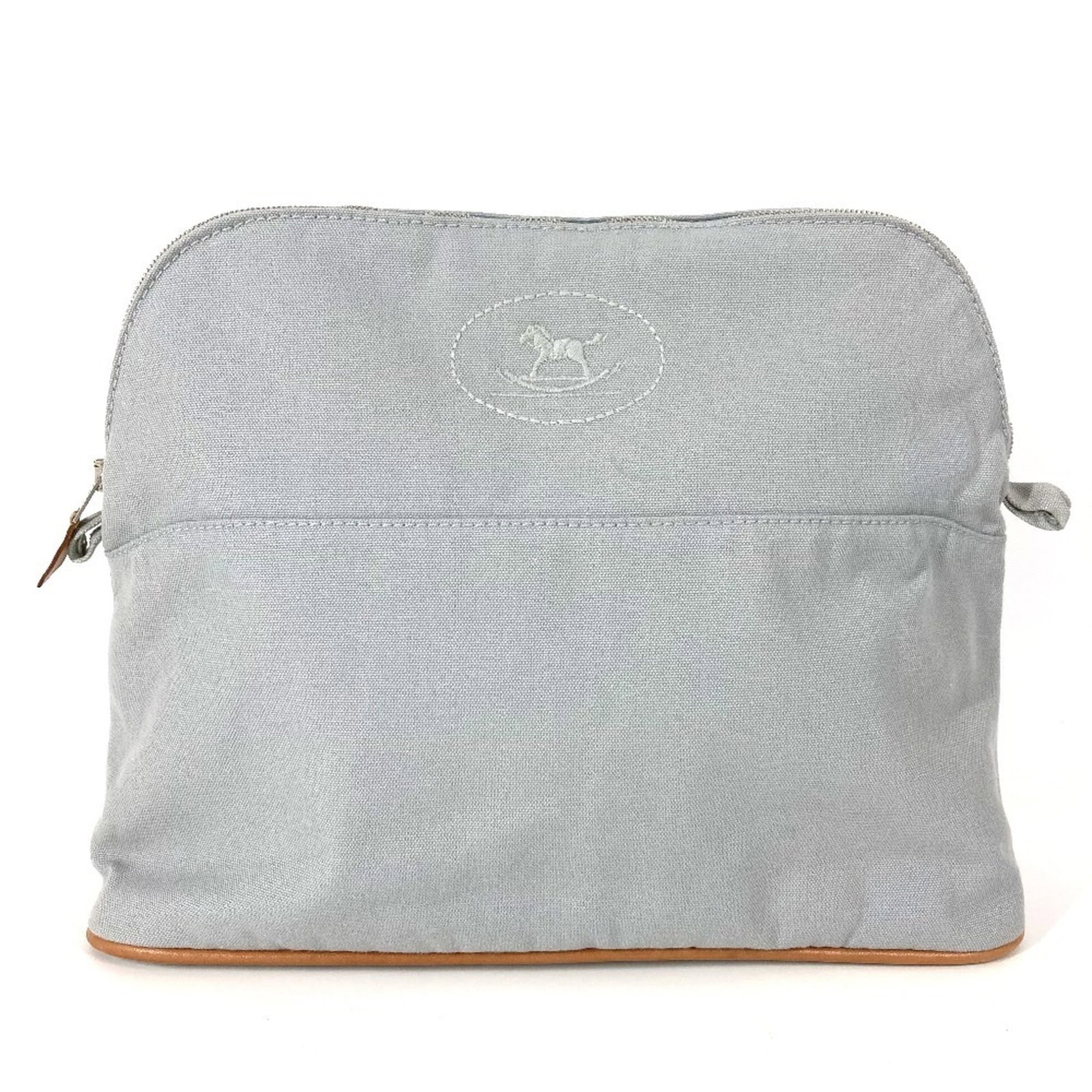 Canvas Pouch Hermes: Canvas Pouch Hermes Canvas Pouch from Hermes, crafted in France with a timeless gray canvas design. This compact pouch measures 23cm x 30cm and features a classic style that complements any outfit.
