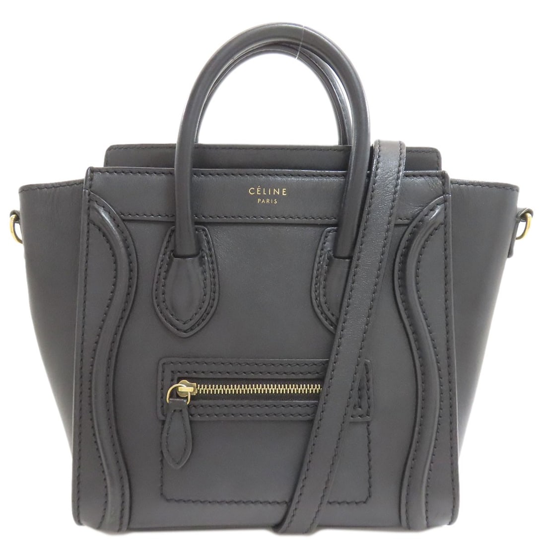 Nano Calf Luggage Handbag Celine 2 Way: Nano Calf Luggage Handbag Celine 2 Way Celine's Nano Calf Luggage Handbag is a sleek and sophisticated design, featuring a black calf exterior with a two-way closure. This stylish handbag boasts a