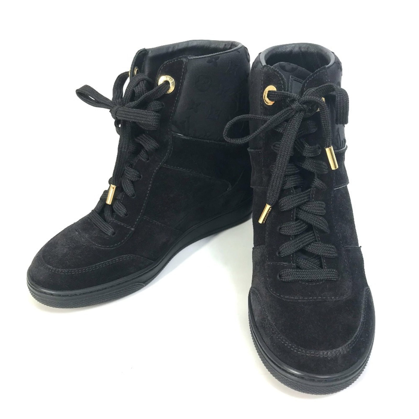 Louis Vuitton sneakers: Louis Vuitton sneakers Suede leather upper, breathable design, and signature details make these Louis Vuitton sneakers stand out. Handmade with care, they come in a sleek black color and are paired wi