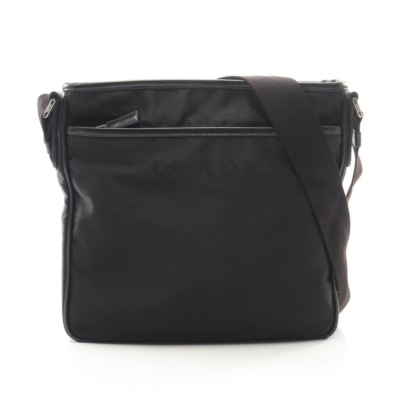 Nylon leather shoulder handbag by Prada: Nylon leather shoulder handbag by Prada Saffiano leather and nylon blend create a unique look in this Prada shoulder handbag, featuring a sleek black design. The bag's durable construction and